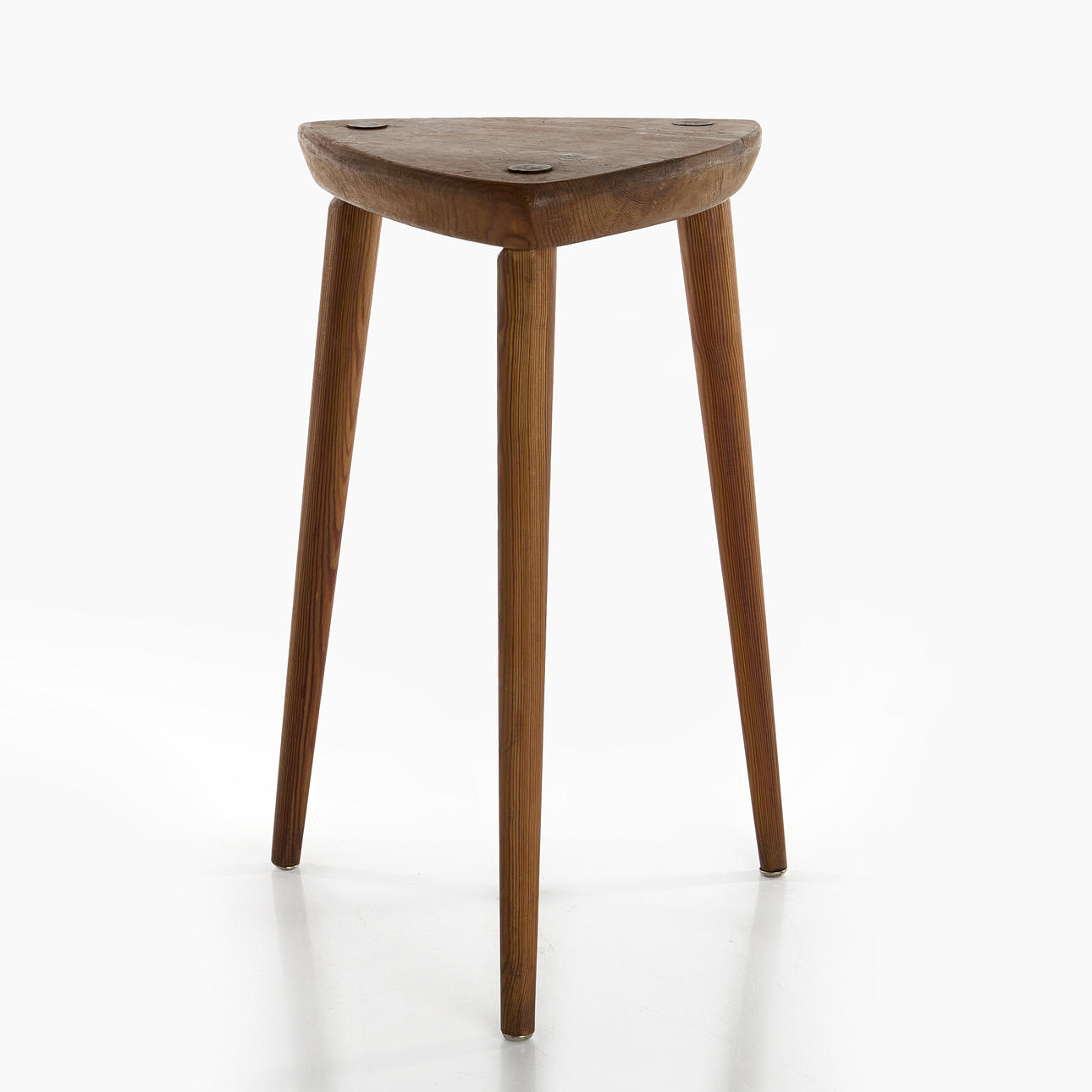 A mid 20th century pine stool.