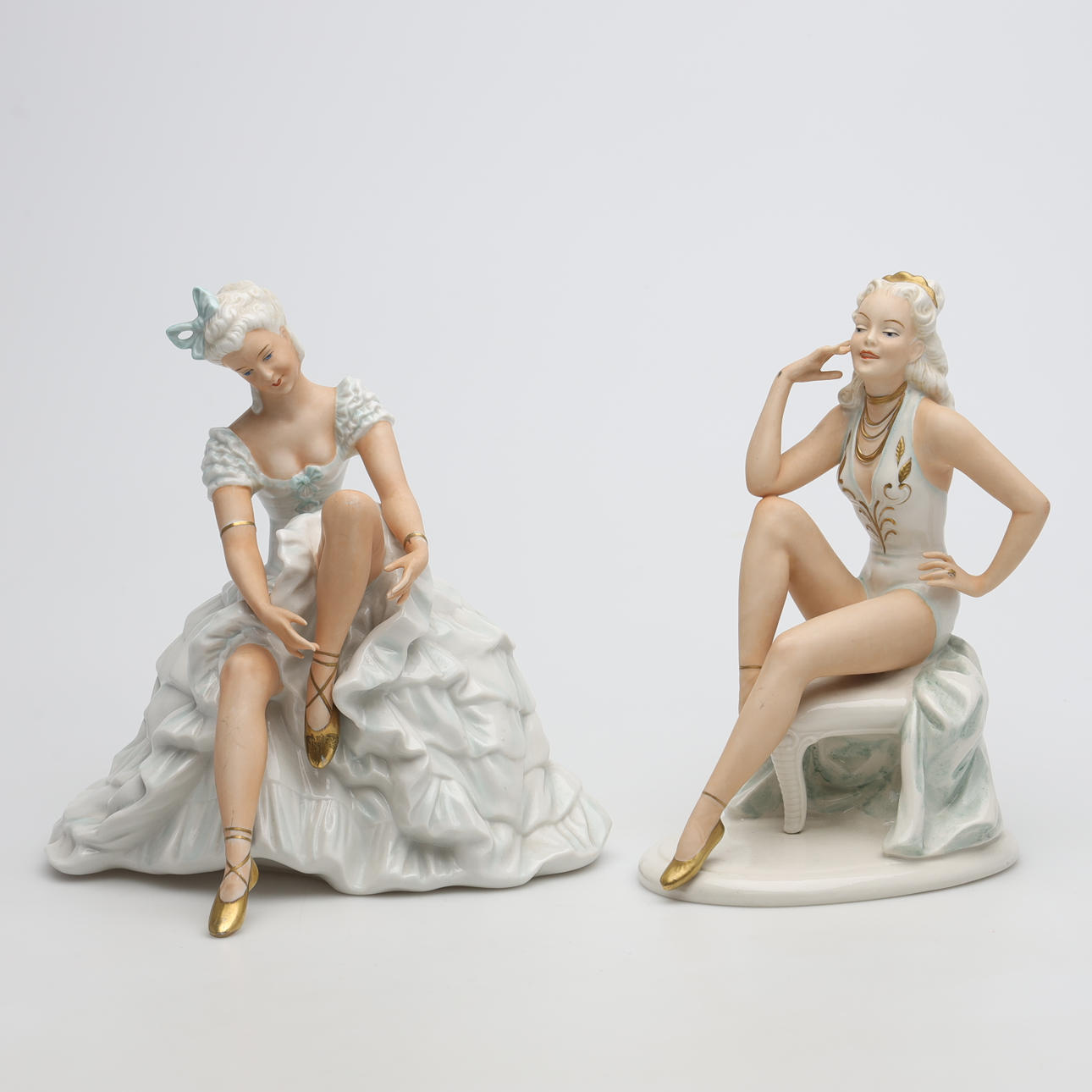 Two German porcelain figurines.