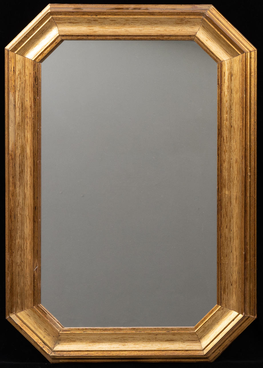 A wooden mirror, 20th century.
