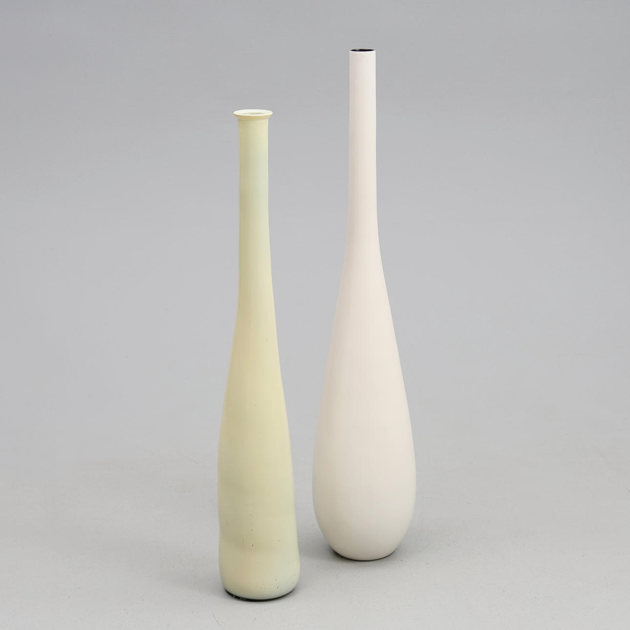 2 FLOOR VASES, glass and plastic.