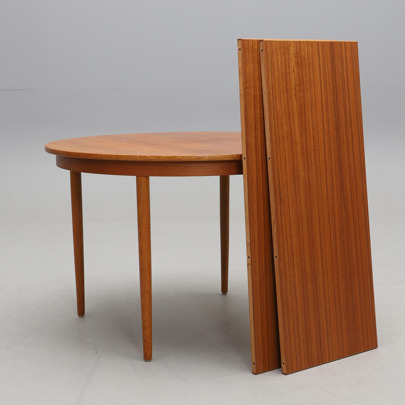 A 1960'S DINING TABLE.