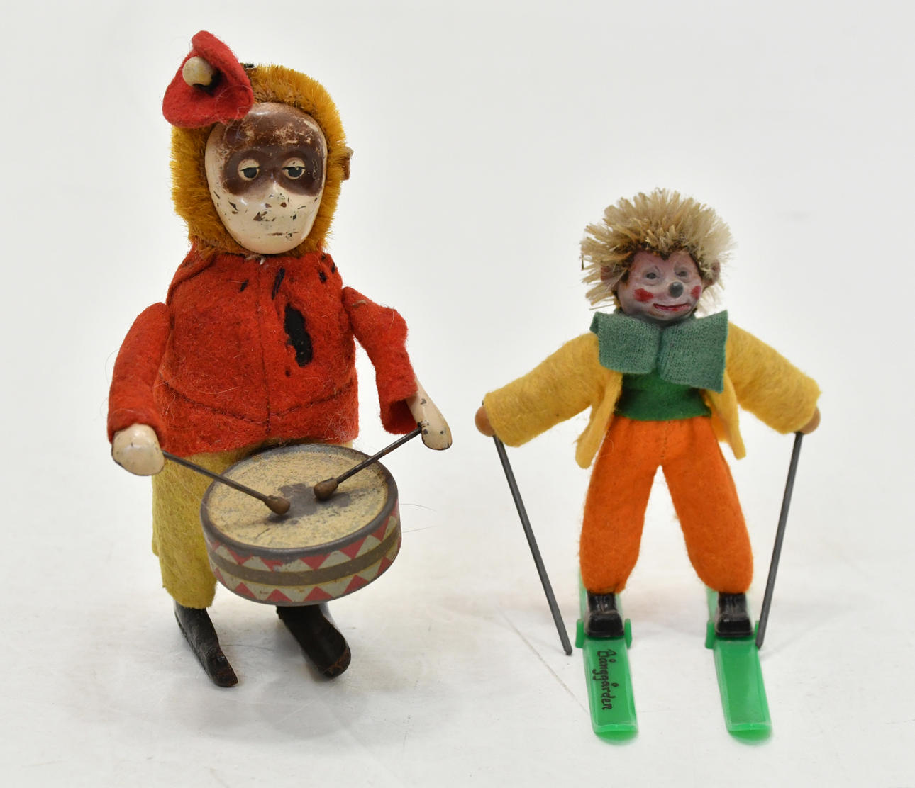 Schuco Monkey Drumming & Hedgehog Figure on Skis.