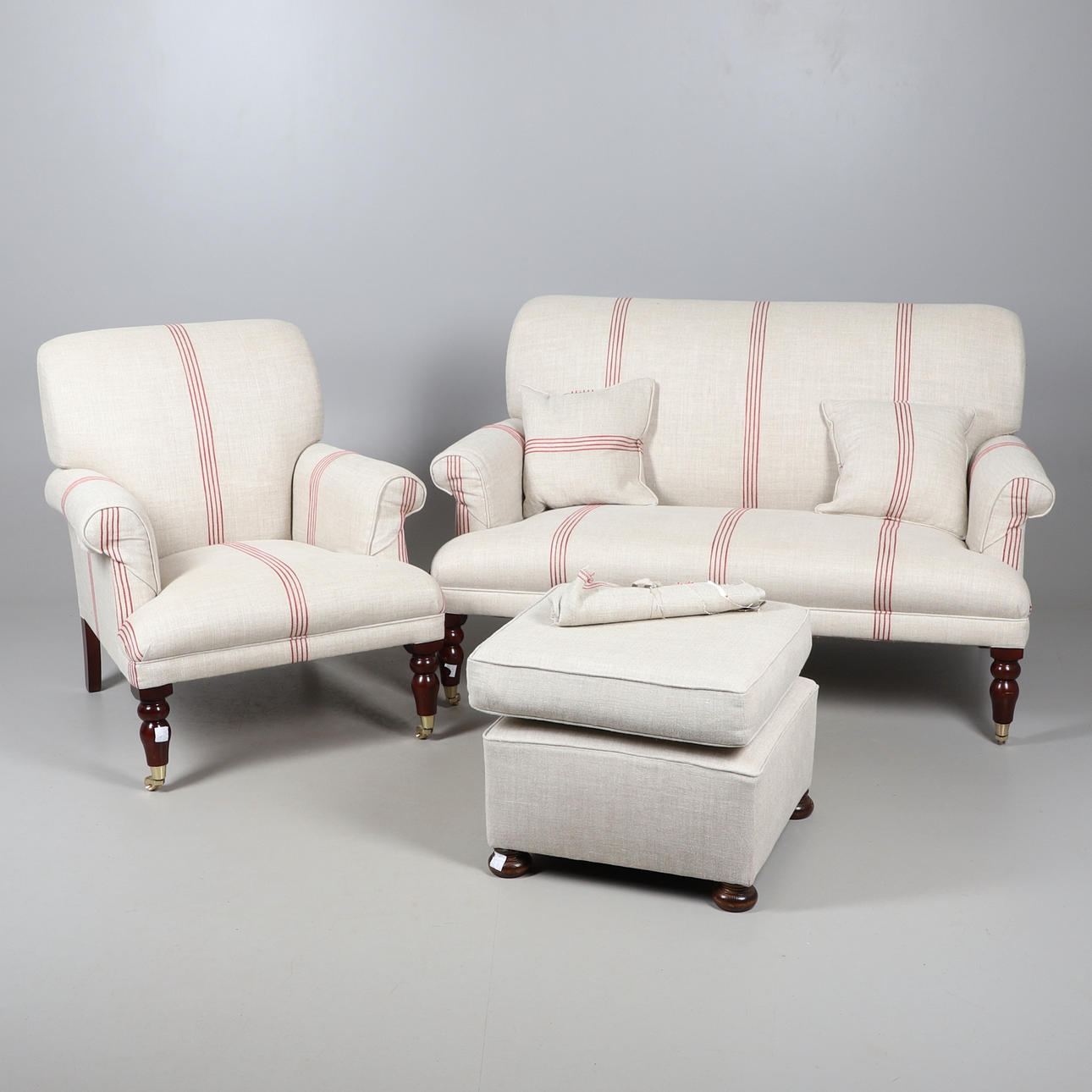 A MODERN TWO SEATER SETTEE AND ARMCHAIR.