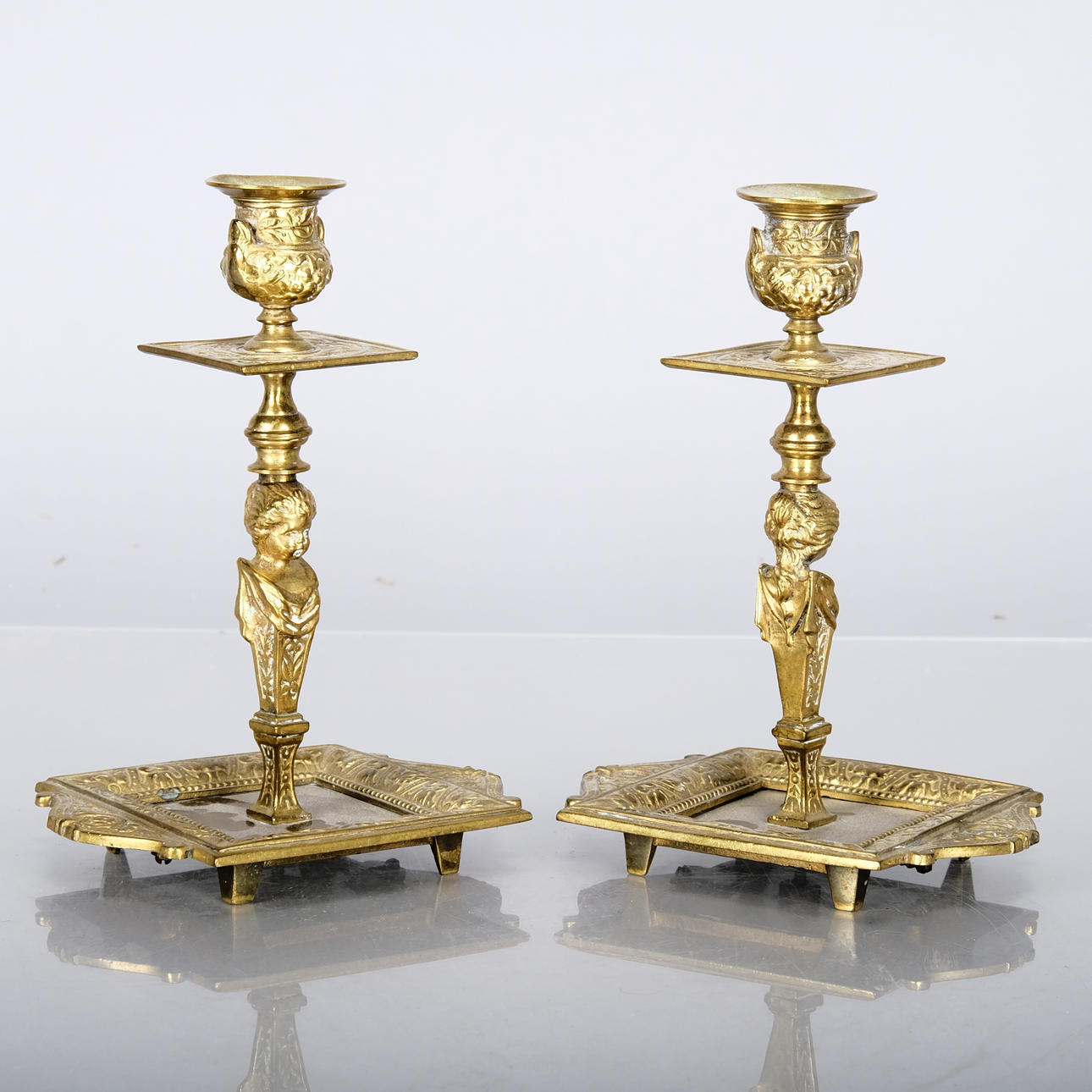 A brass candlesticks, Neo-Renaissance, 19th century (2 pcs).
