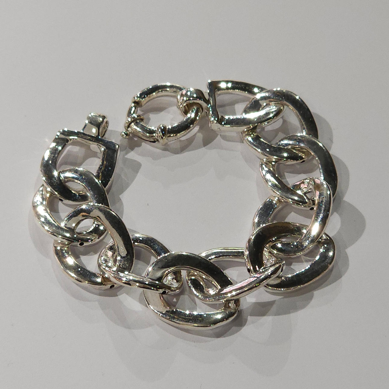 Silver link chain bracelet.