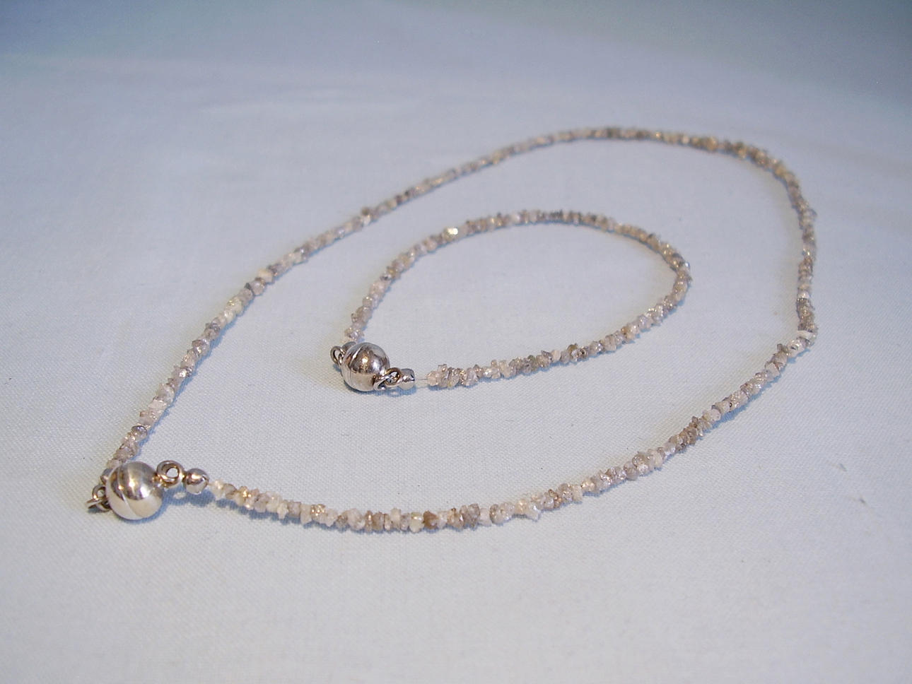 DIAMANTHALSBAND och DIAMANTARMBAND, ca.50 ct.