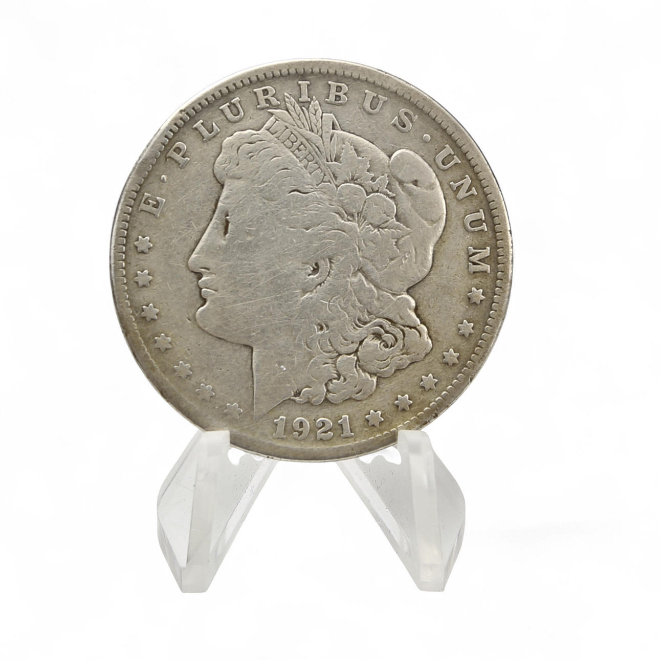 A silver US dollar coin, 1921.