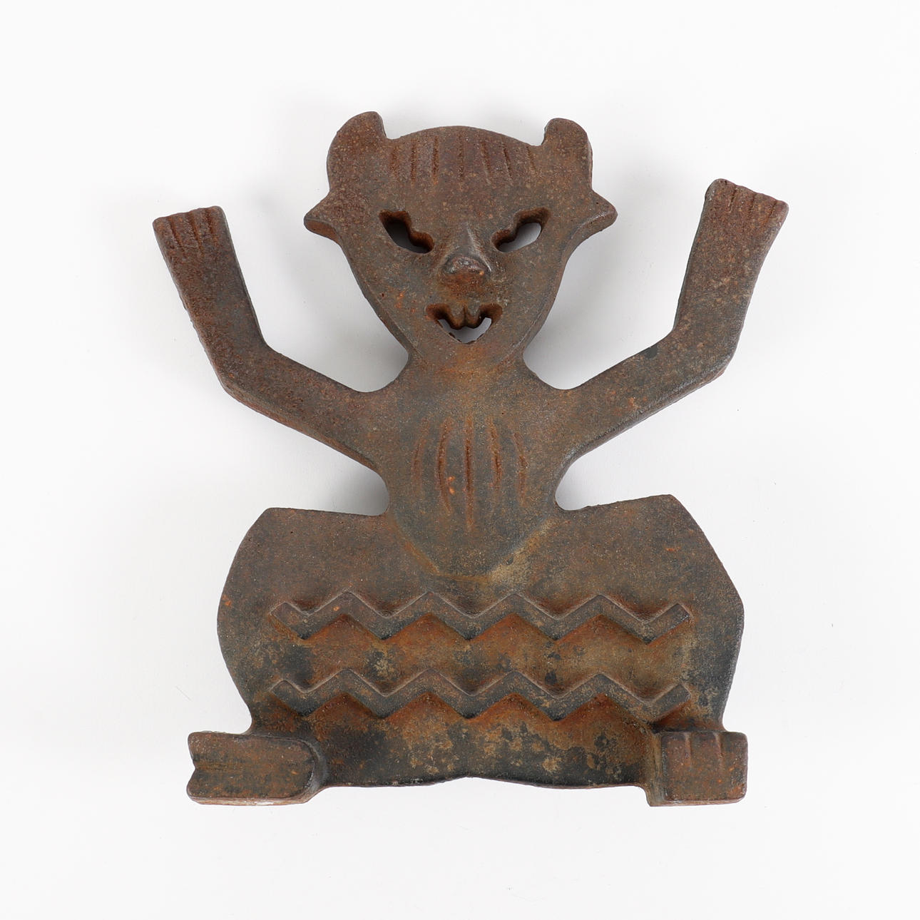 ELDHUND gjutjärn, i form av djävul.