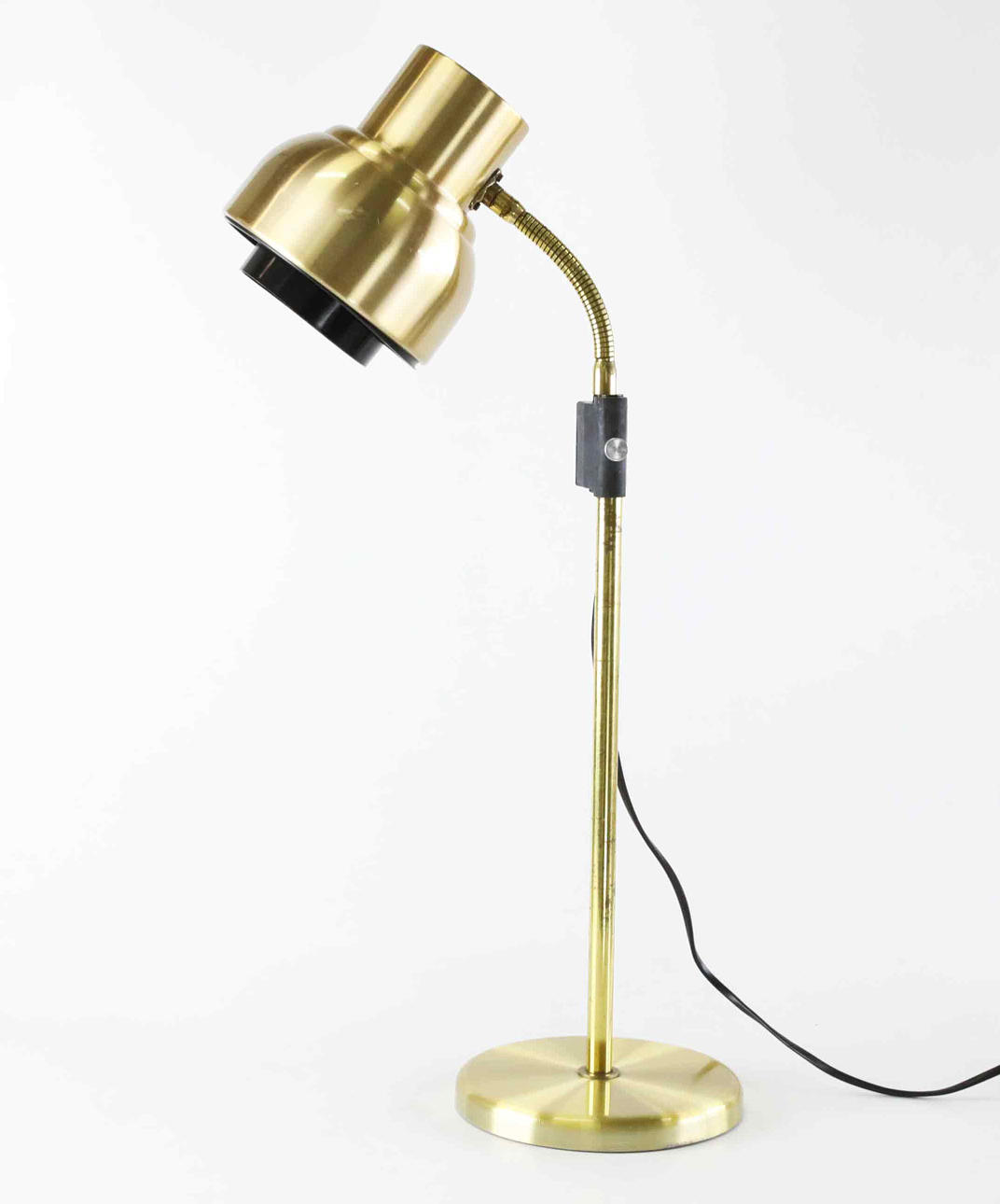 A 1970s metal table lamp.