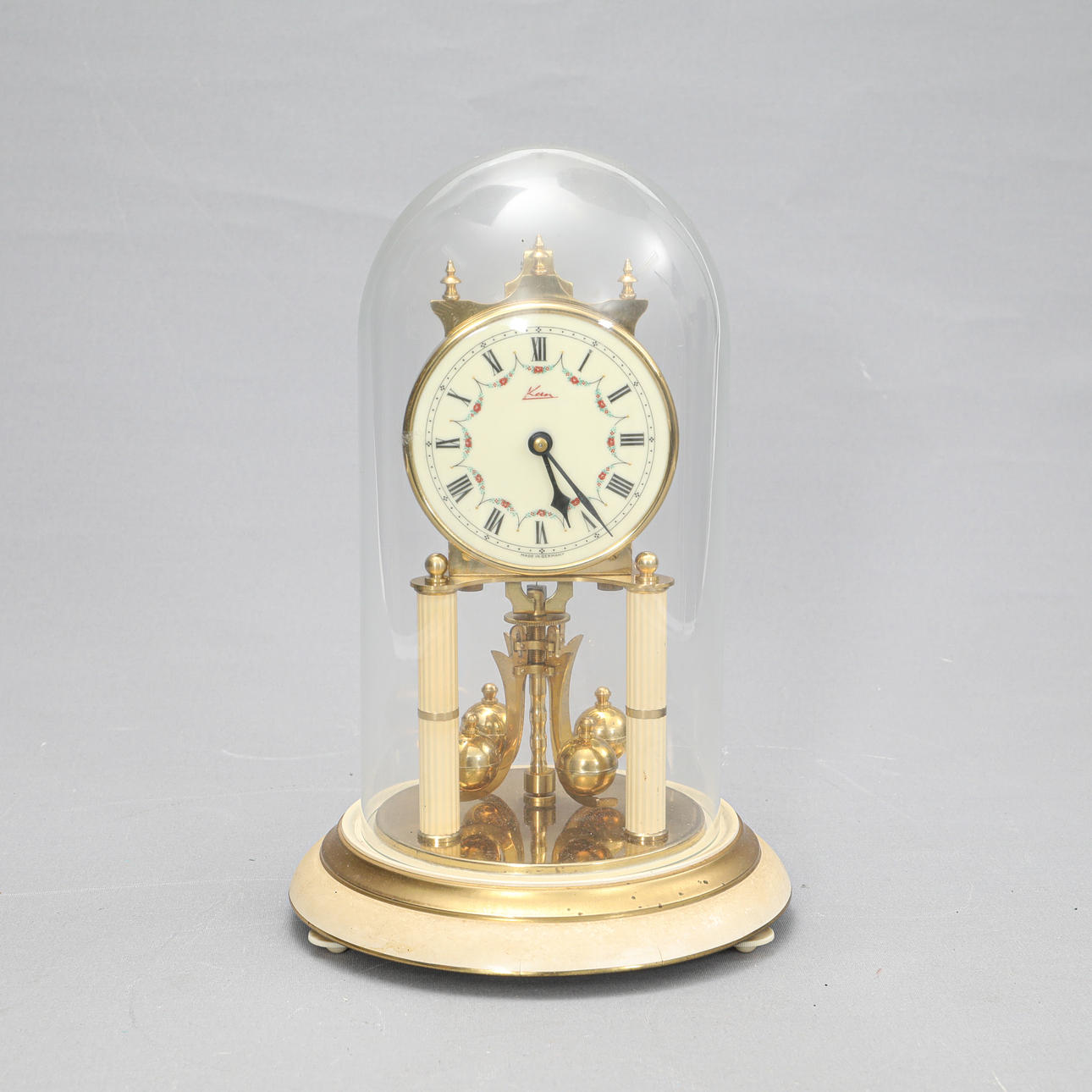 TABLE CLOCK, "Can “, glass/brass.