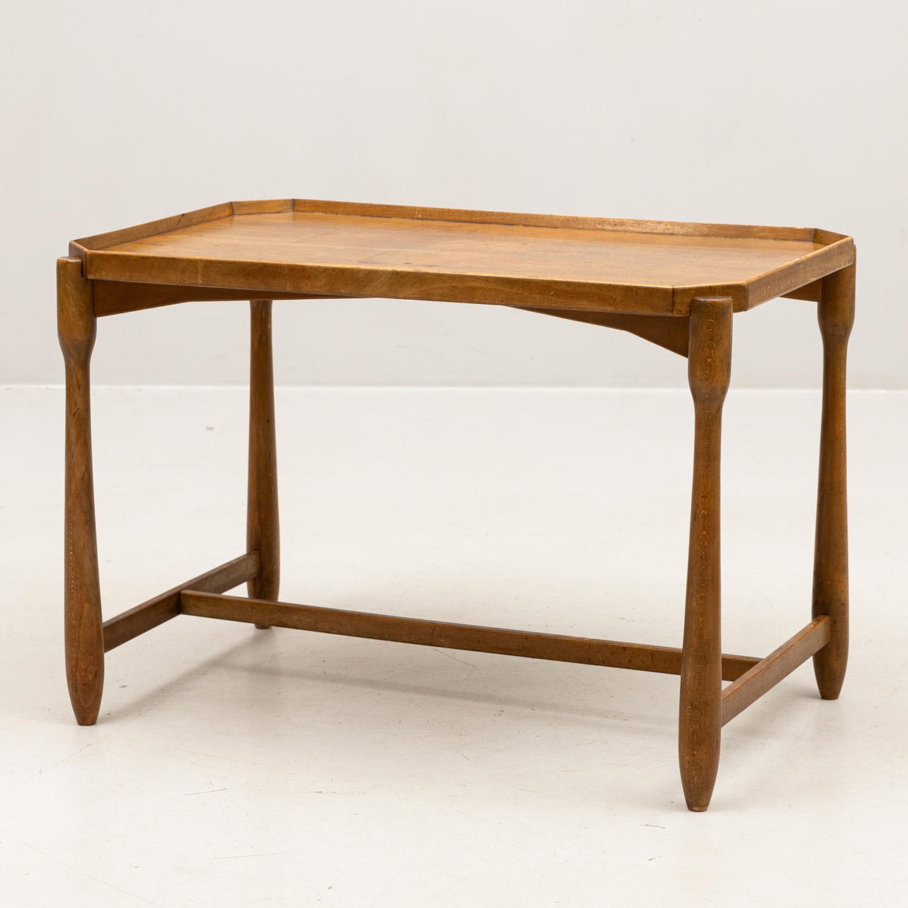 A walnut tray table, mid 20th century.