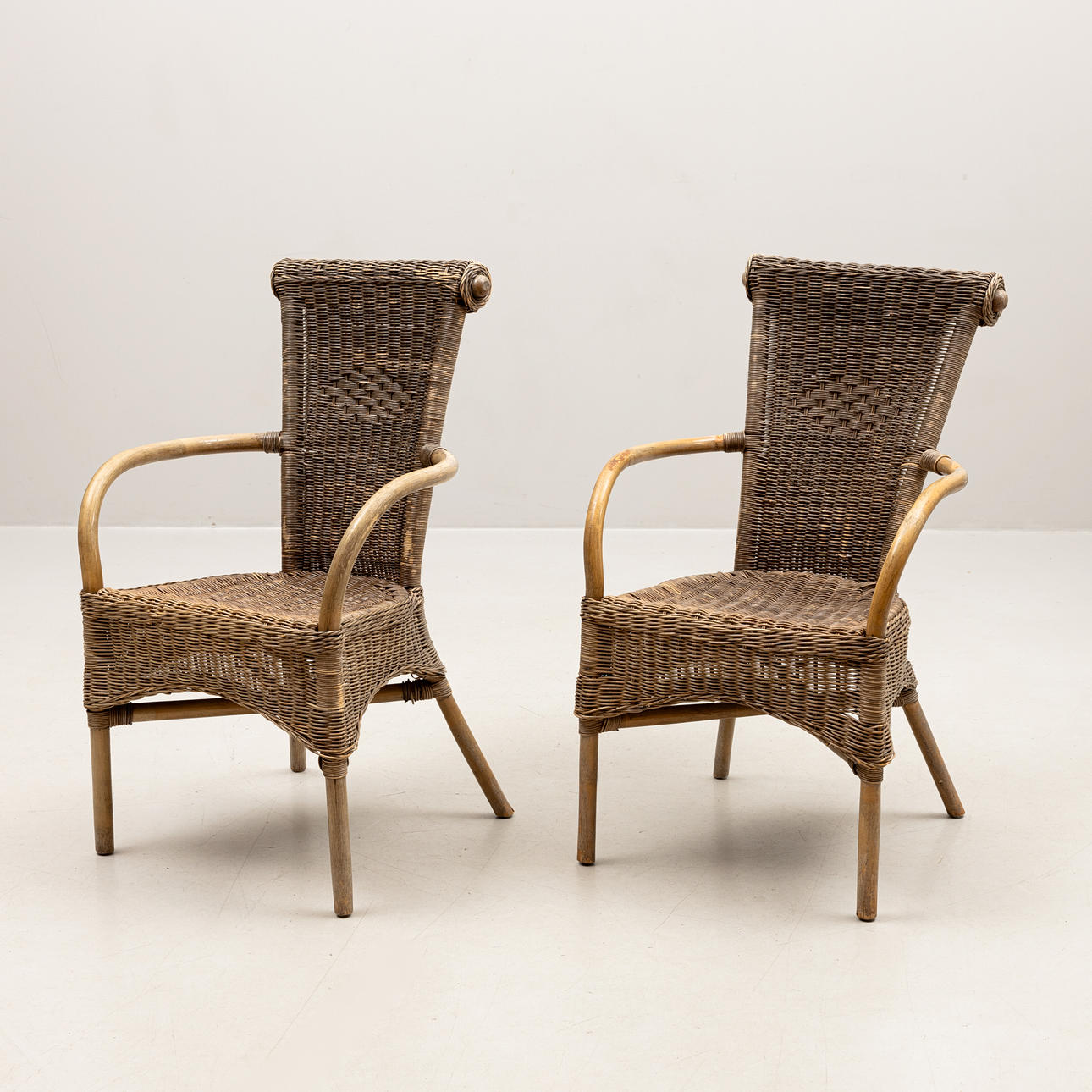 Paar Rattansessel, 20. Jahrhundert.