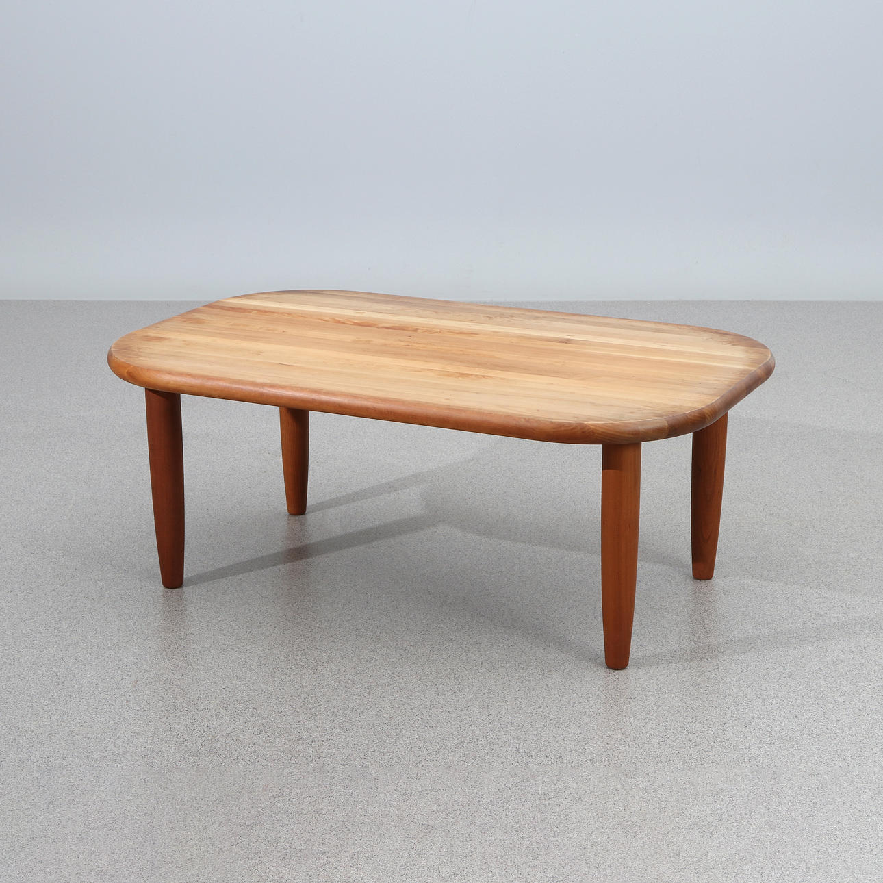 HALSEV, COFFEE TABLE. Cherry. Contemporary Manufacturing. Plaque marked underneath.