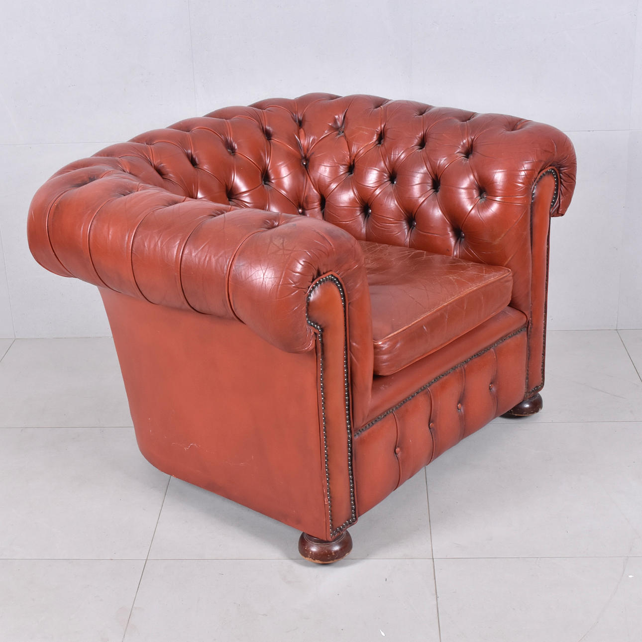 An armchair, Chesterfield model.