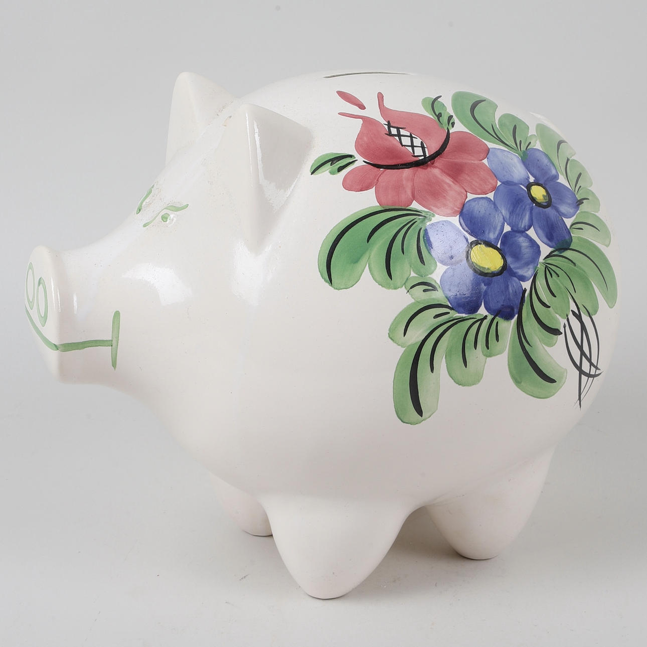 En sparegris i porcelæn, Guldkrog.