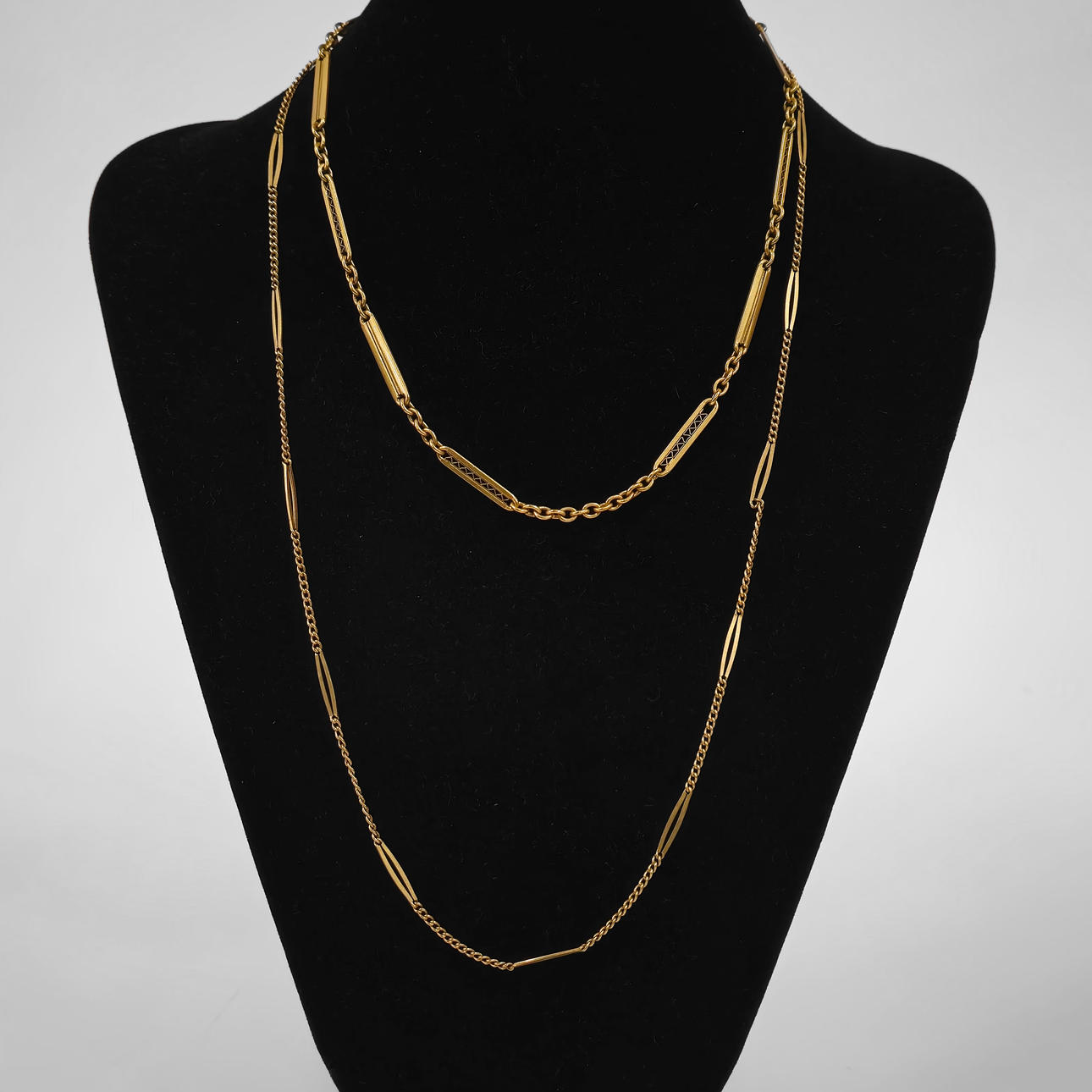 2 ANTIQUE LEONTINA GOLD-PLATED WATCH CHAINS.