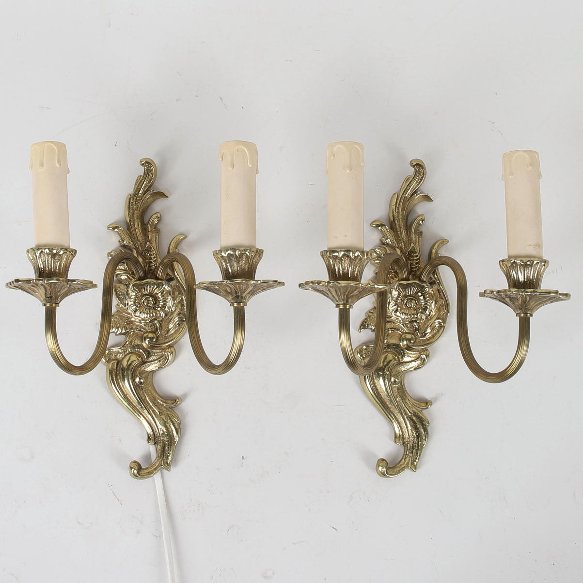 A pair of wall sconces, brass.