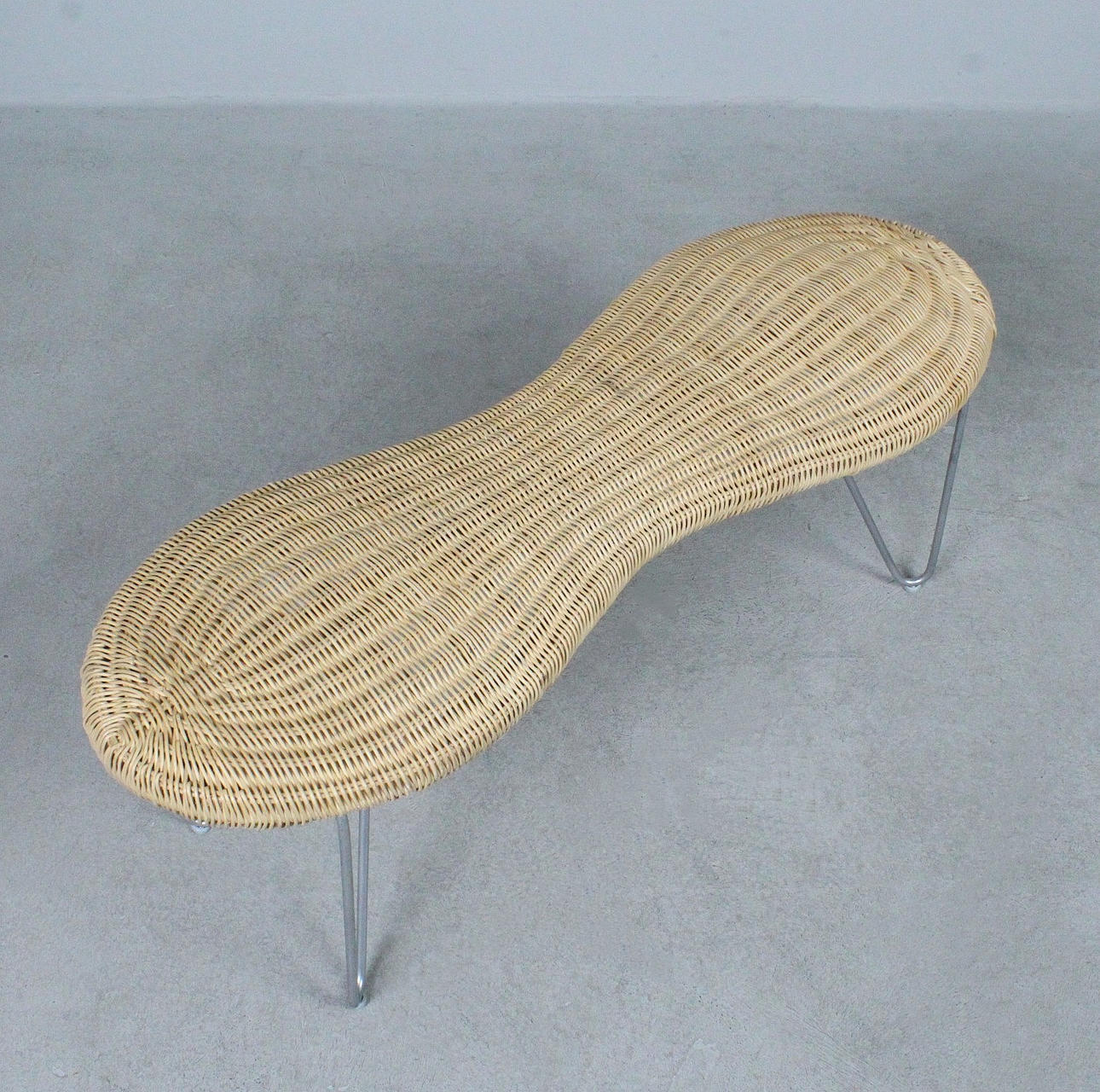 IKEA. 'Peanut' wicker bench/stool, Sweden, 1980s.