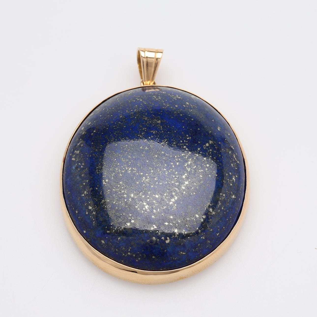 ANHÄNGER, 18 KARAT GOLD UND LAPISLAZULI.