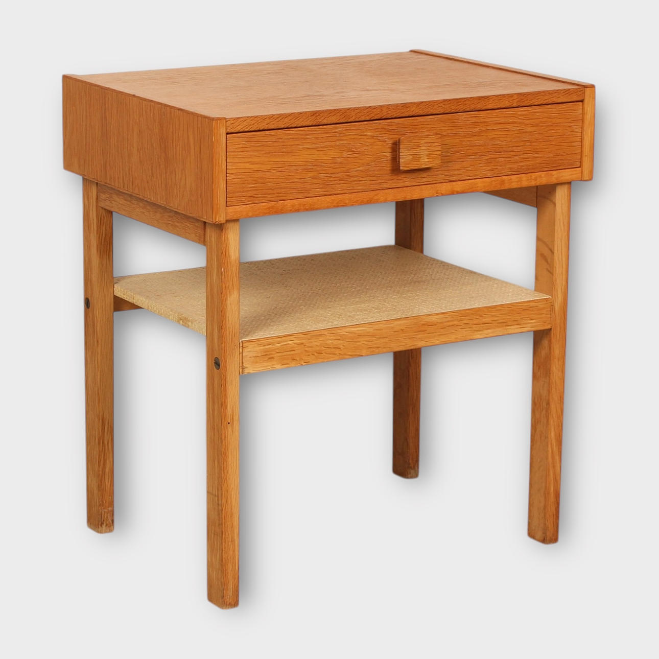 A 20th century oak bedside table.