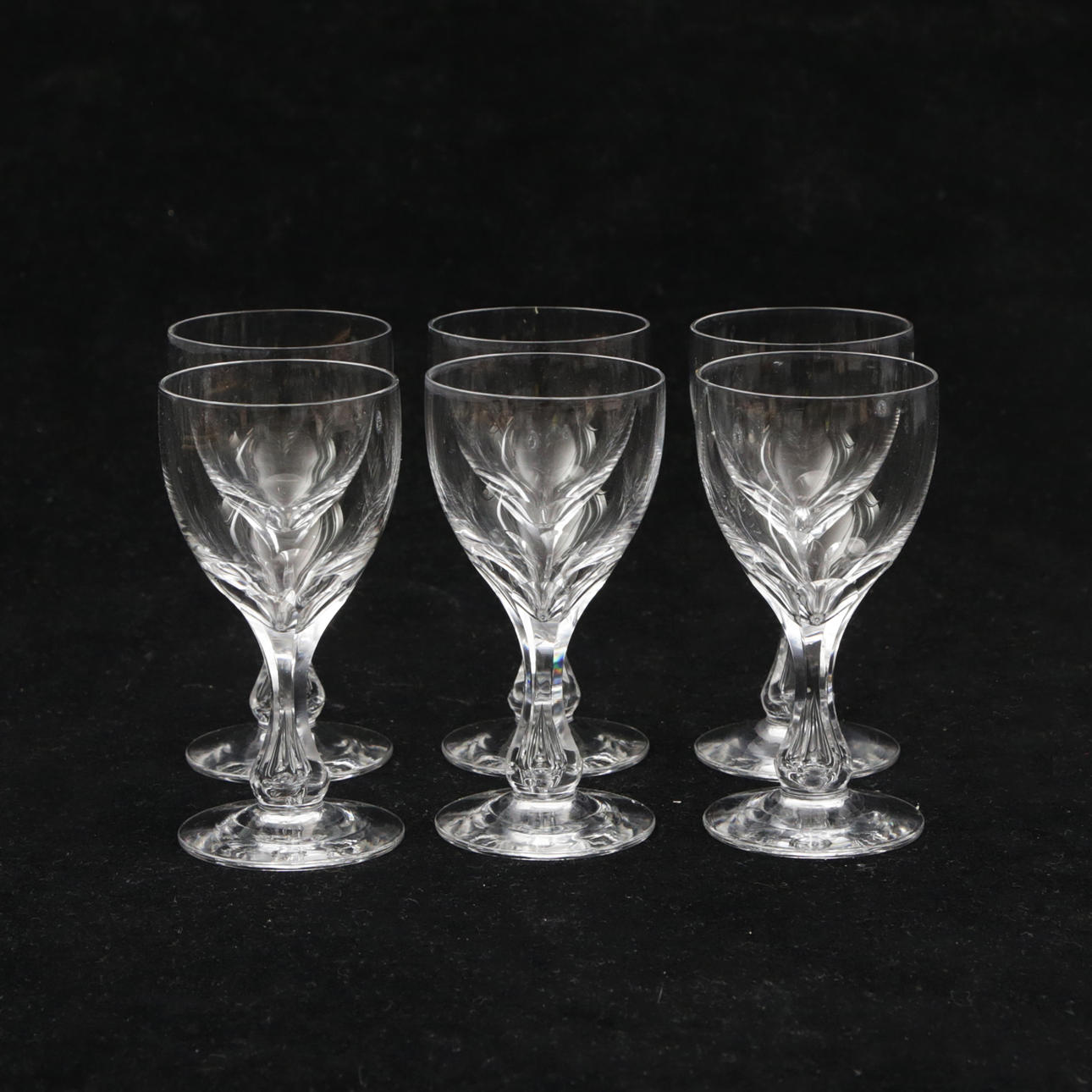 A set of 6 glasses, with sanded leg.