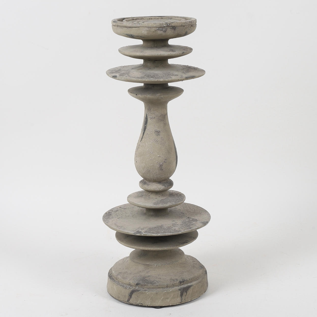A 20th century stoneware candlestick.