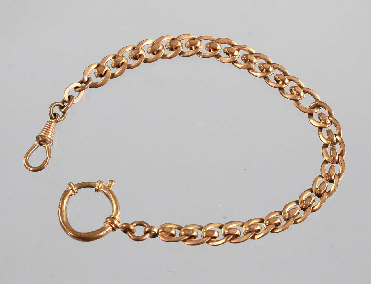 GOLDDOUBLÉ KELLOKETJU NOIN 1900.