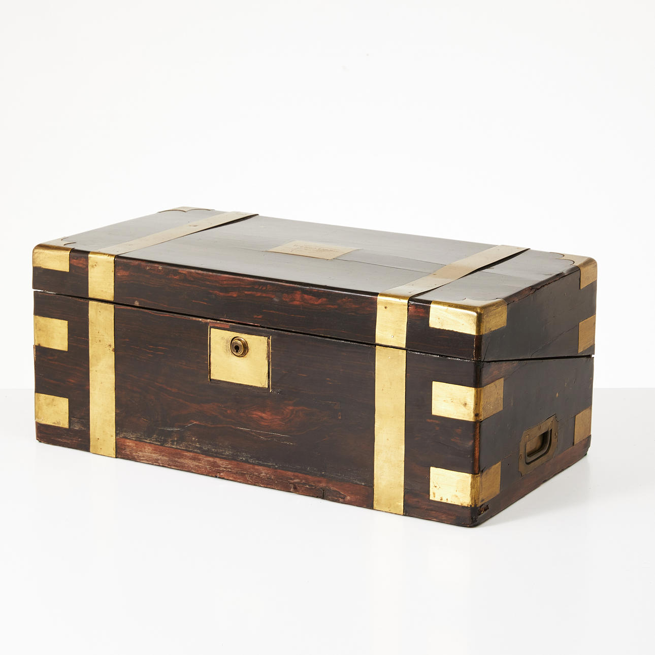 A 1870s writing desk, cover with plaque reading “Dr Edward J. Wallace 15th Oct 1875", dark stained wood with brass details, leather interior, ink horns and boxes.