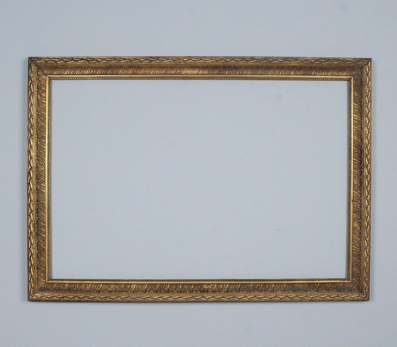 Large frame/wooden picture frame.