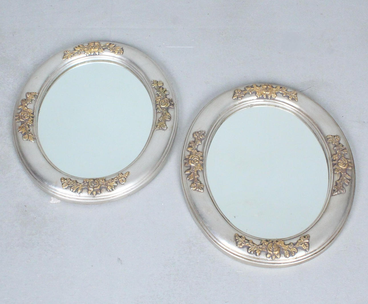 A pair of mirrors/wall mirrors.