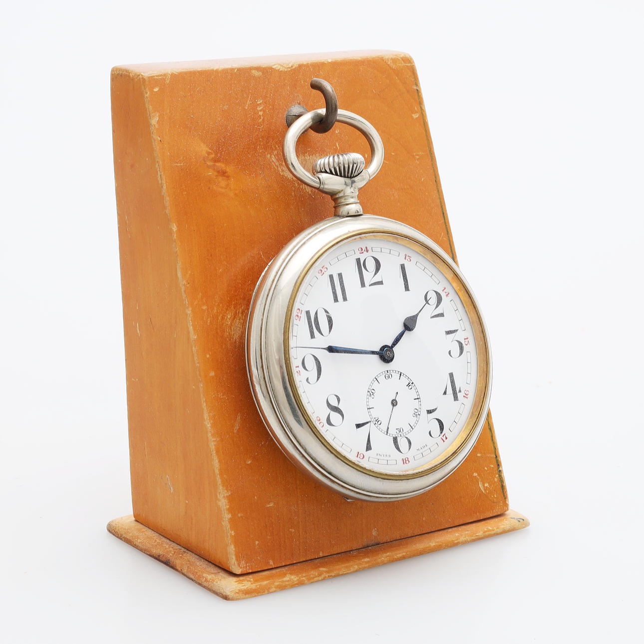 Taskukello lennätintyöstä, 1900-luvun alkupuoli.