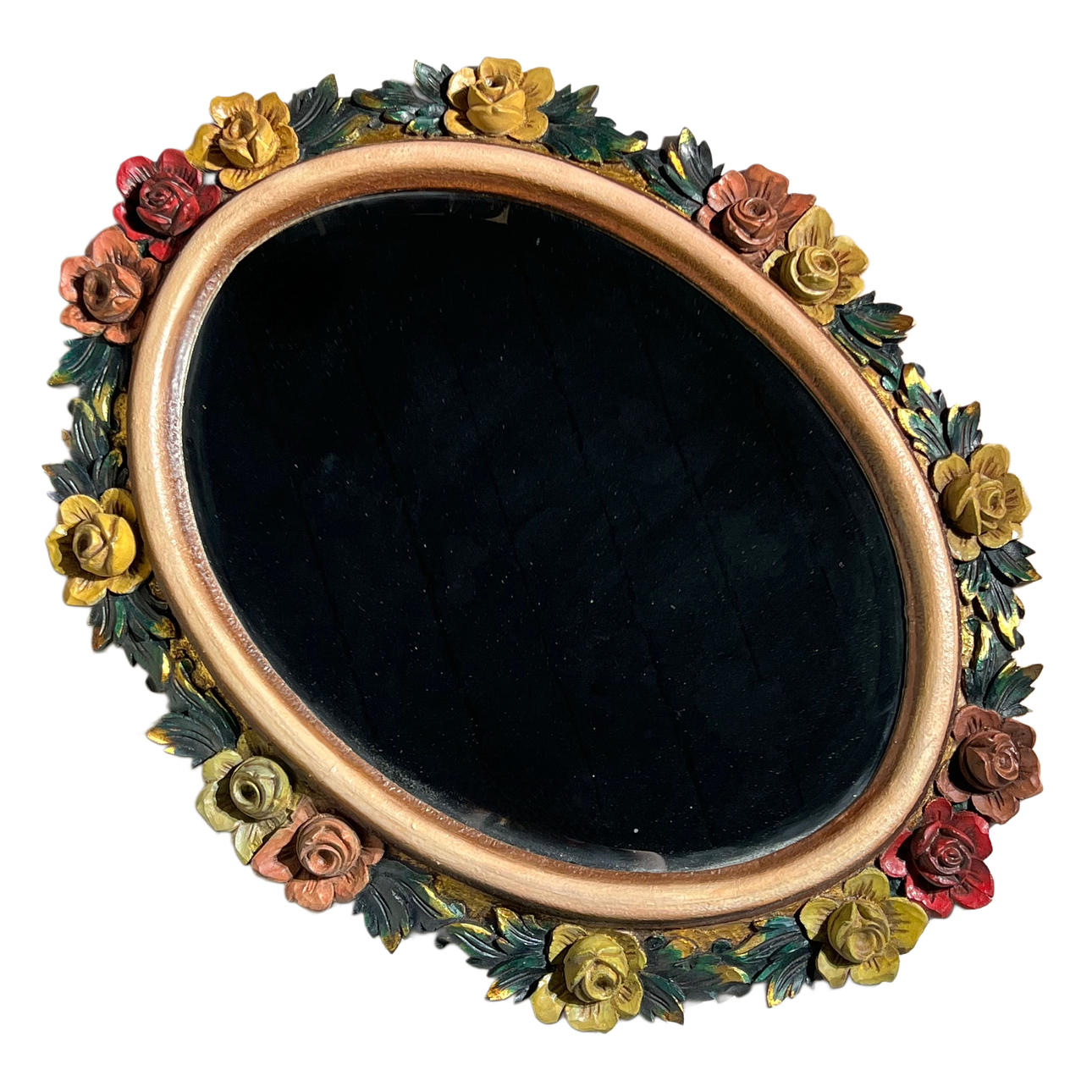 Snidad träspegel som bildar polykroma rosor.