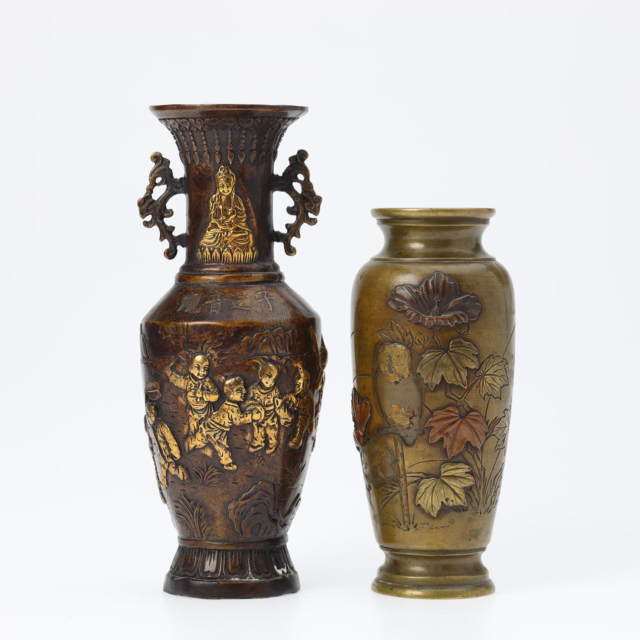 Two vases of bronze, decorated with varied motifs of plants and figures, China (2).