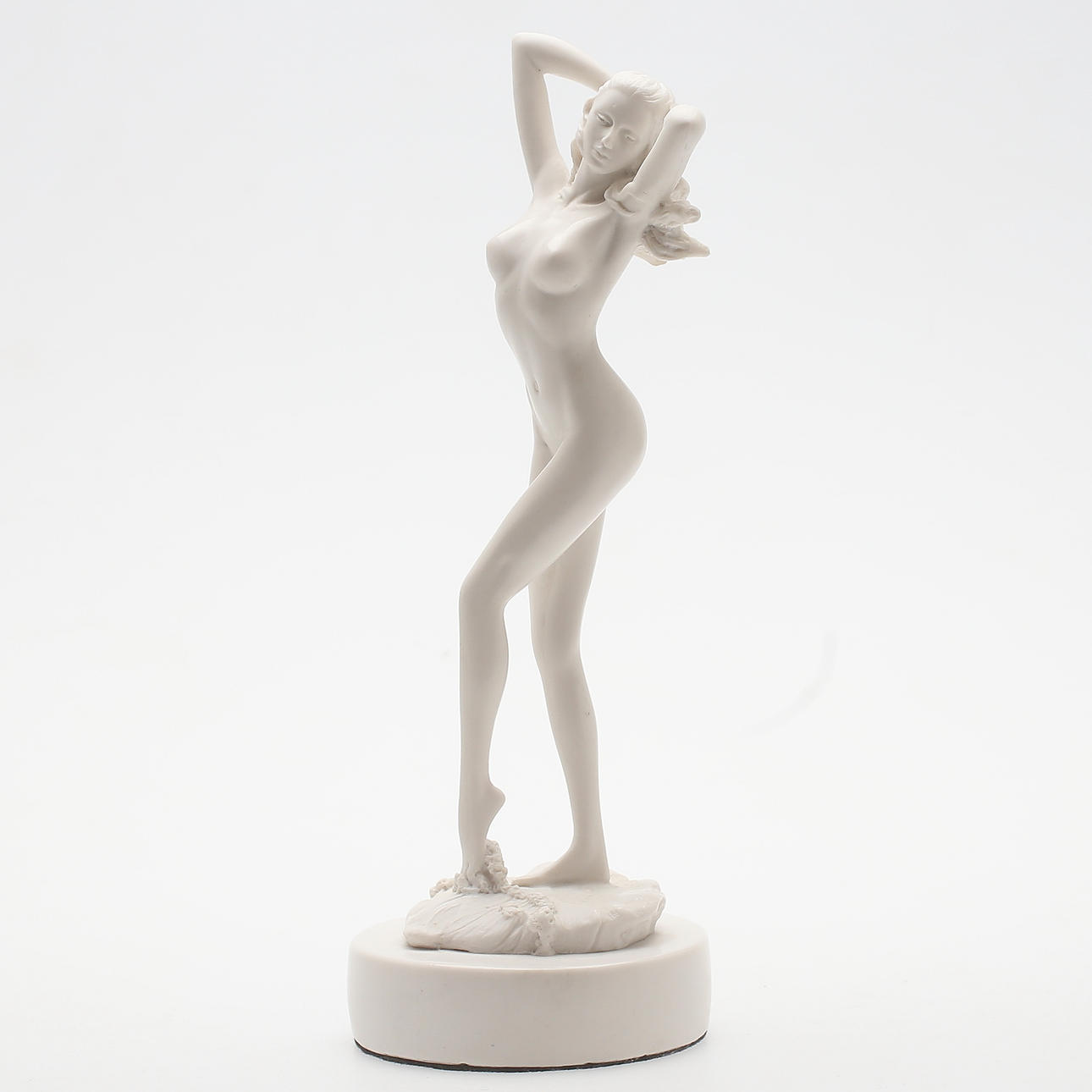 SKULPTUR, i form av naken Kvinna, krossad marmor, samtida.