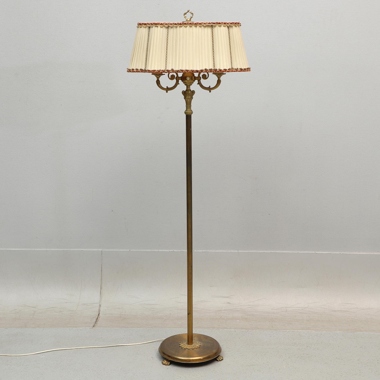 A brass floor lamp, 1940s.