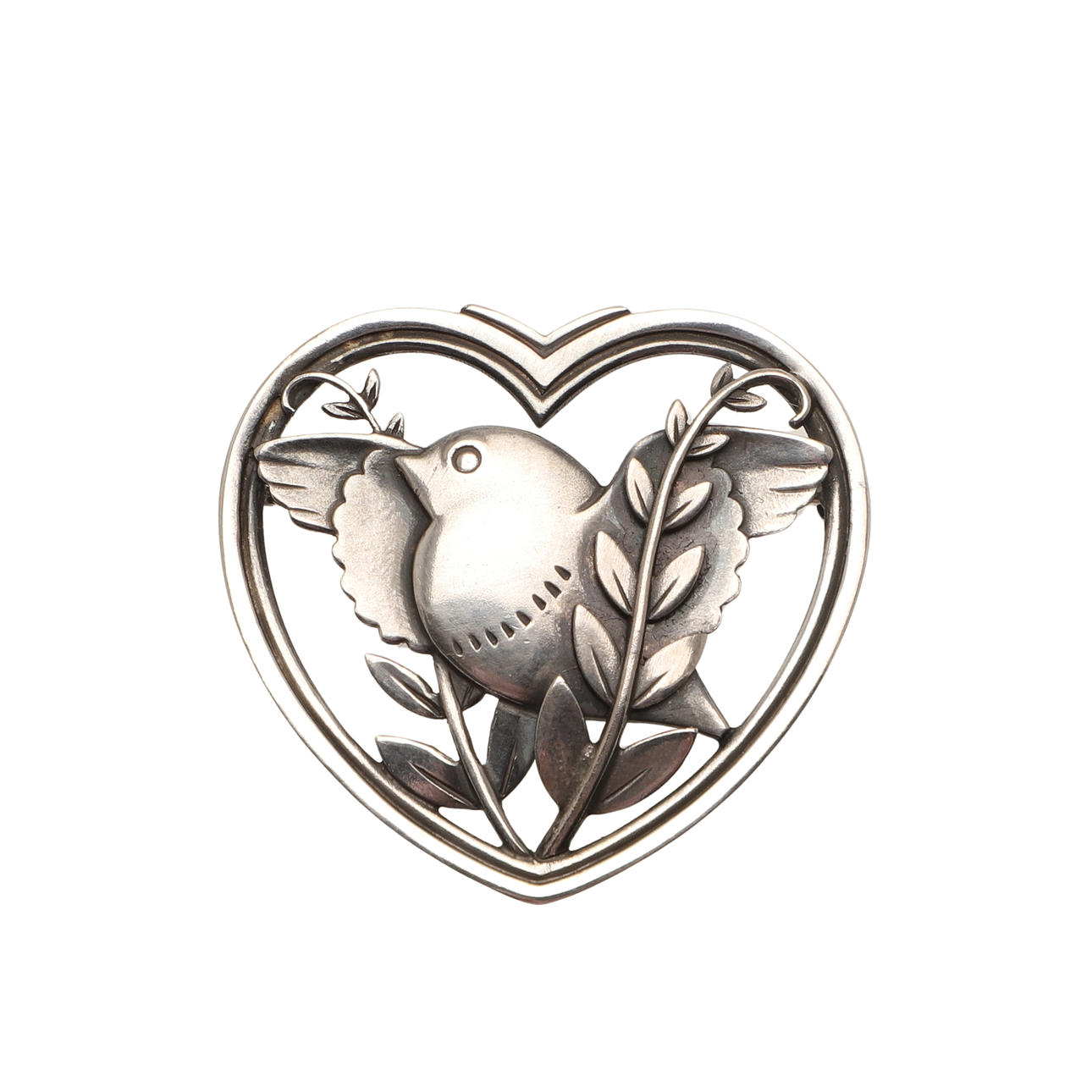 A SILVER HEART SHAPED BROOCH BY GEORG JENSEN.