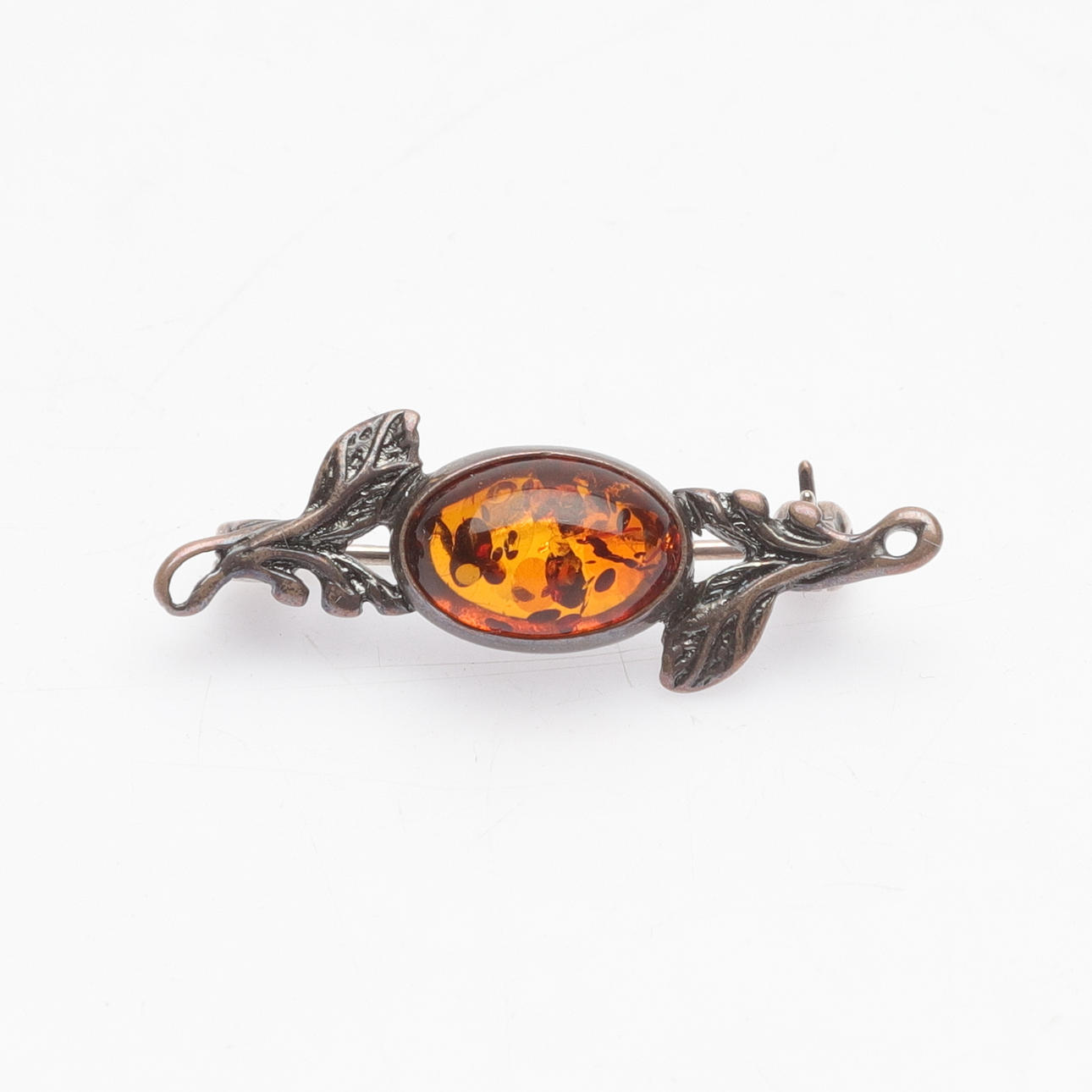 A silver/amber brooch, 20th century.
