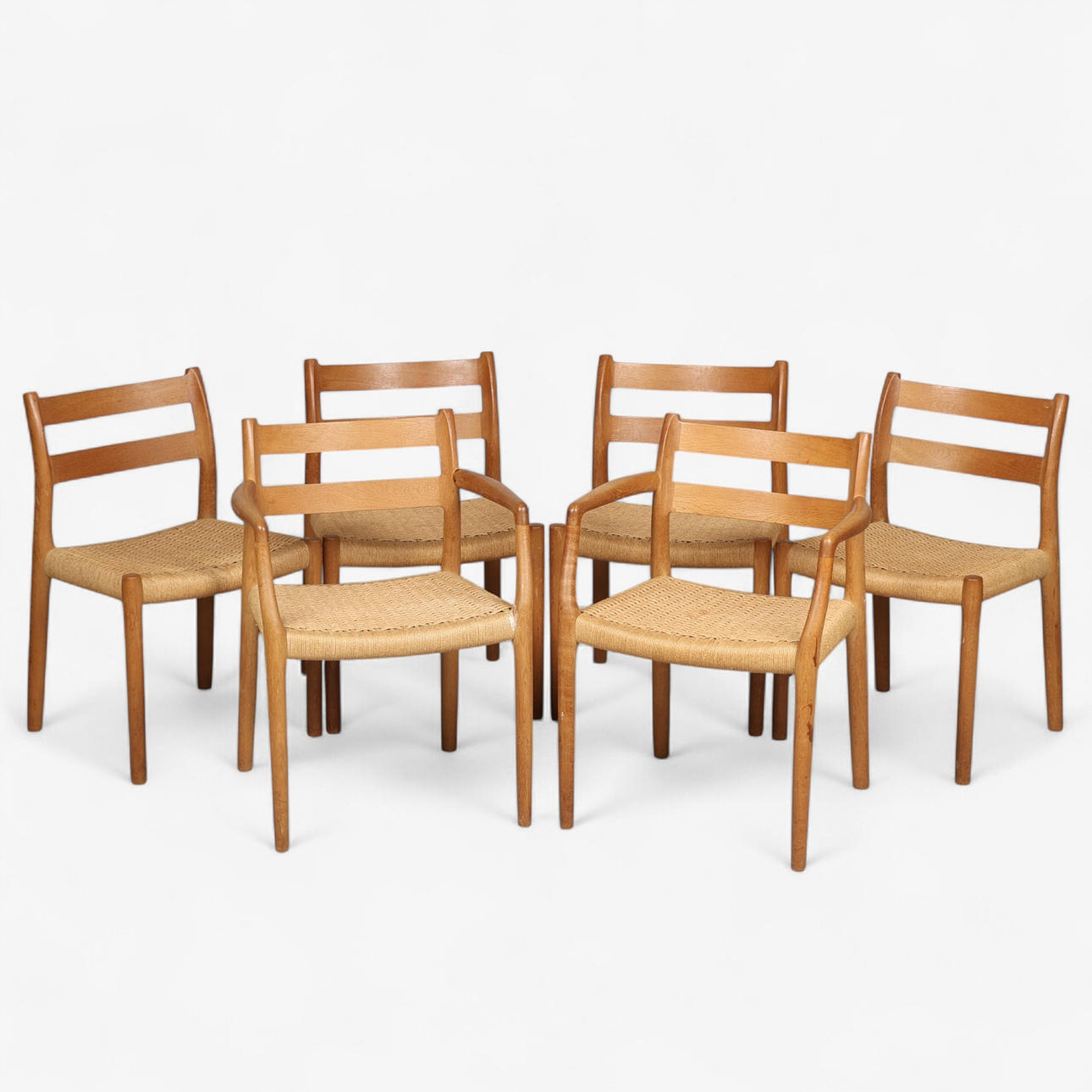 N.O. MØLLER, set of six chairs, including two armchairs, model 67, oak ...