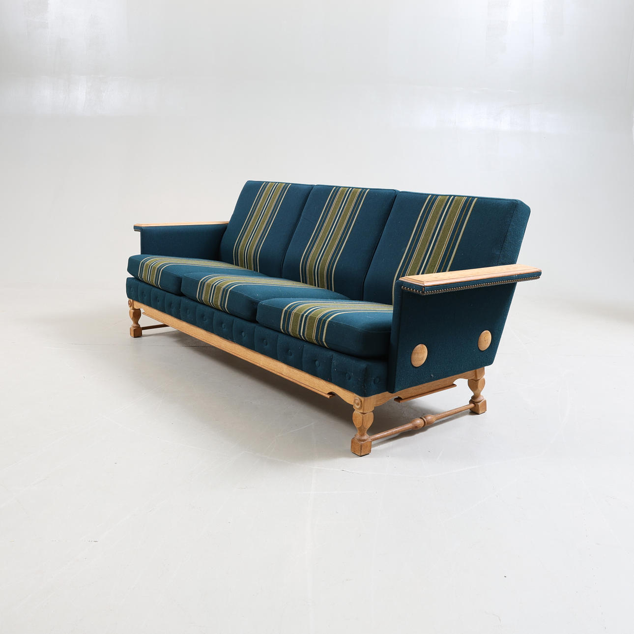 HENNING KJAERNULF. A 20th century oak sofa.