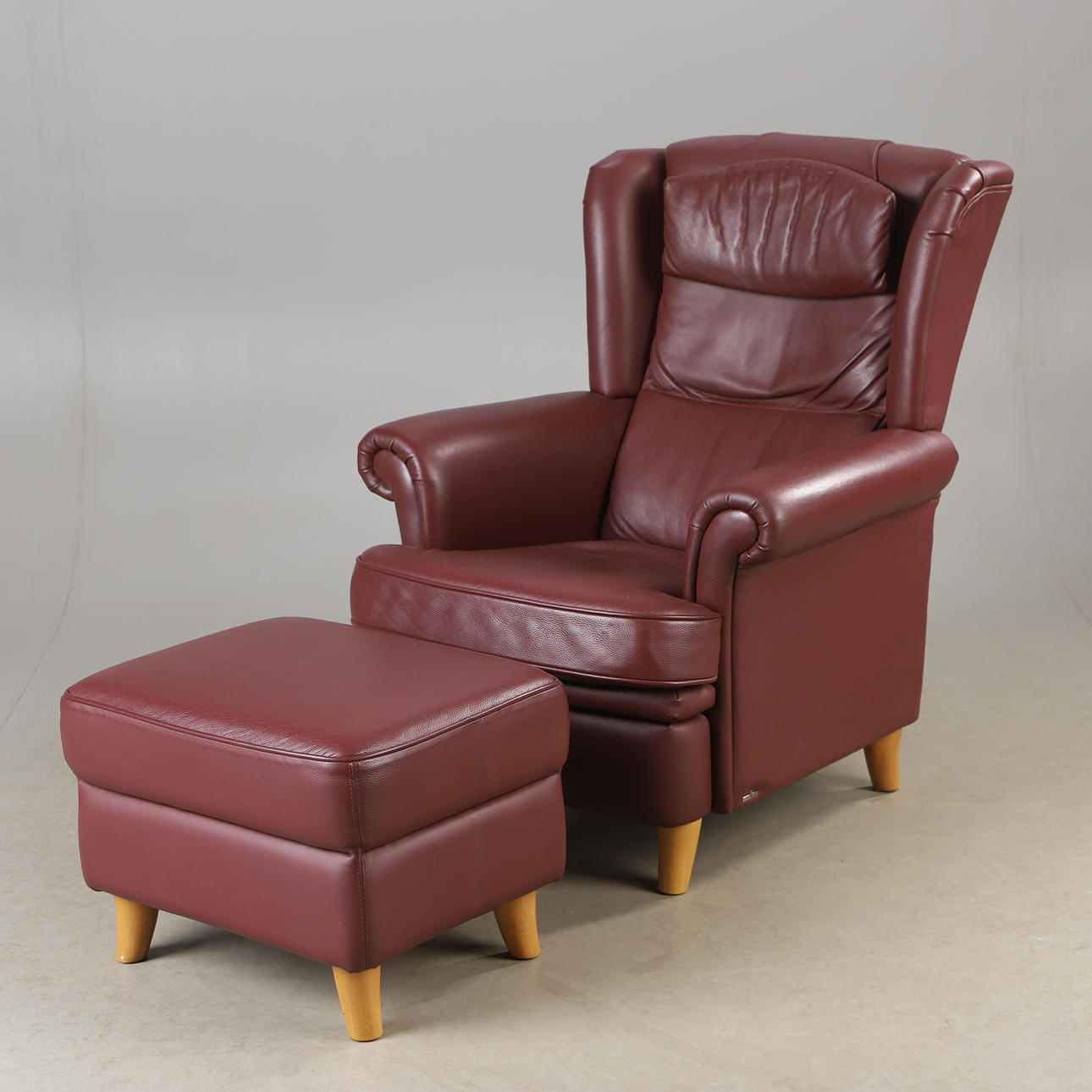 ARMCHAIR WITH FOOTSTOOL, brown leather, Bröderne Andersson.