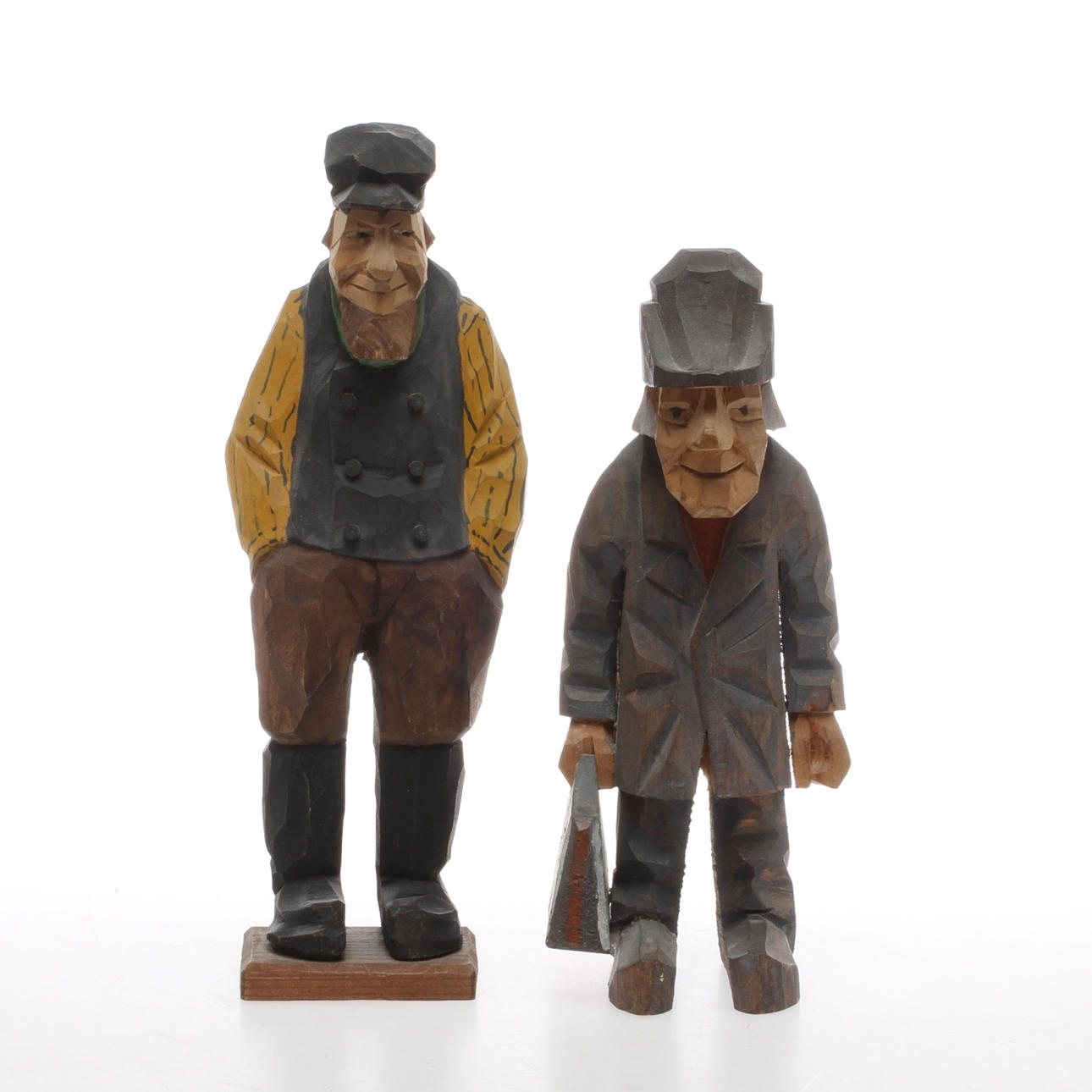 FIGURINER, 2 st, skuret och bemålat trä, varav en Lorens Larsson, 1900-tal.