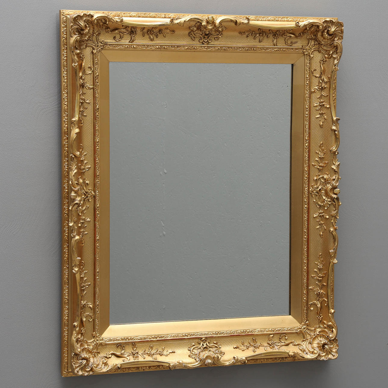 A 19th century rococo style mirror.