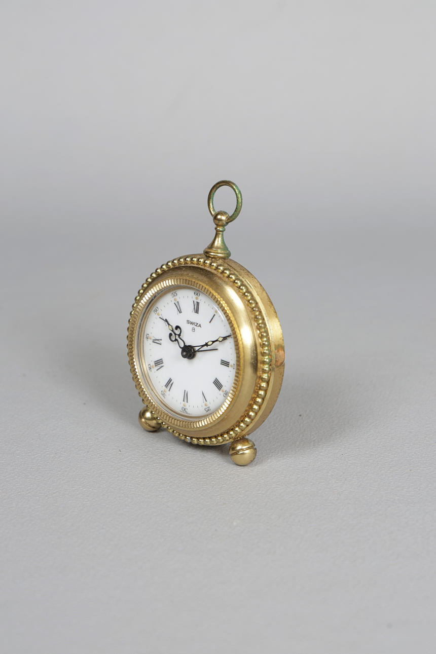 A SWIZA 8 DAY TRAVEL CLOCK. Clocks & Watches - Carriage