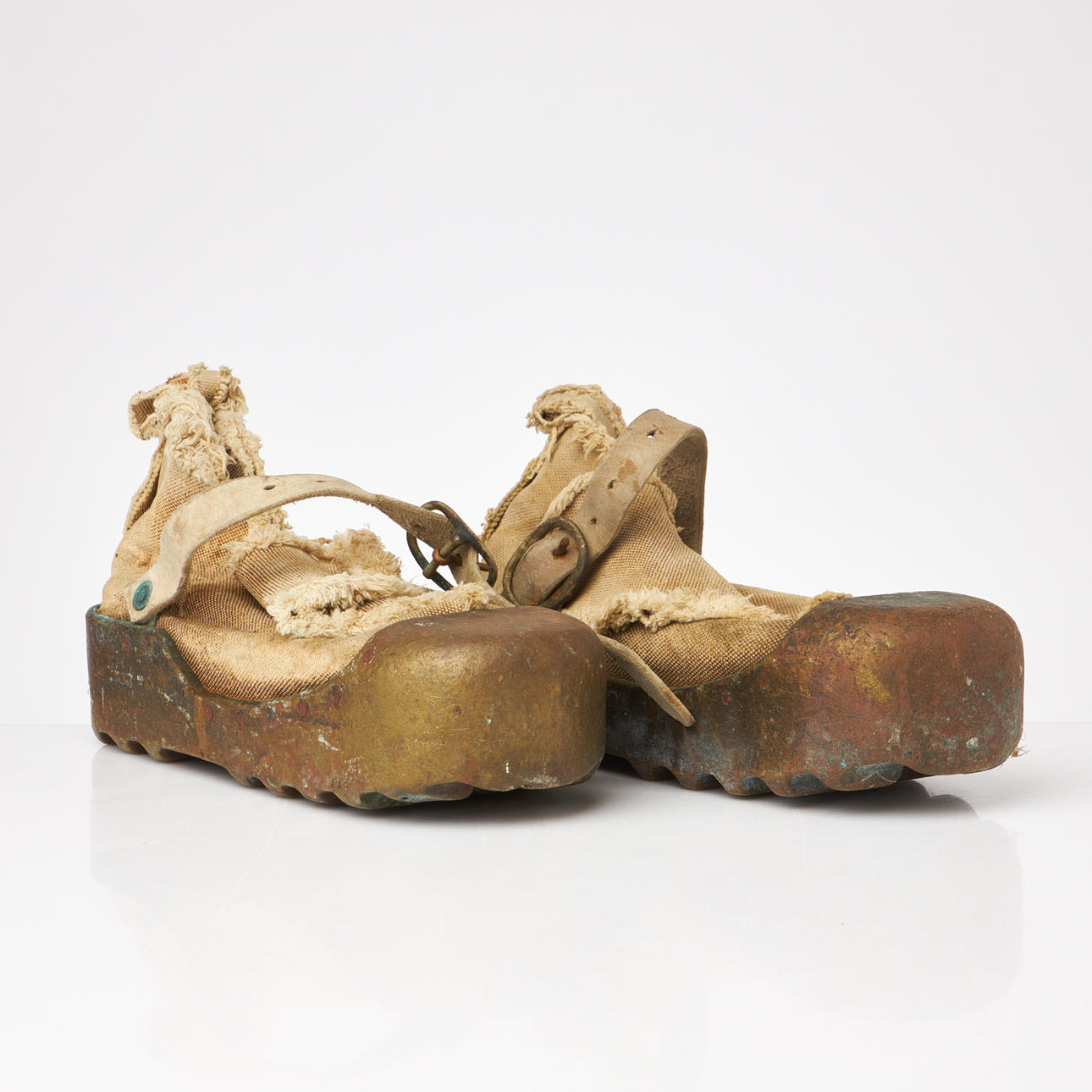 DIVING SHOES. Mid-20th century, bronze, impregnated canvas.