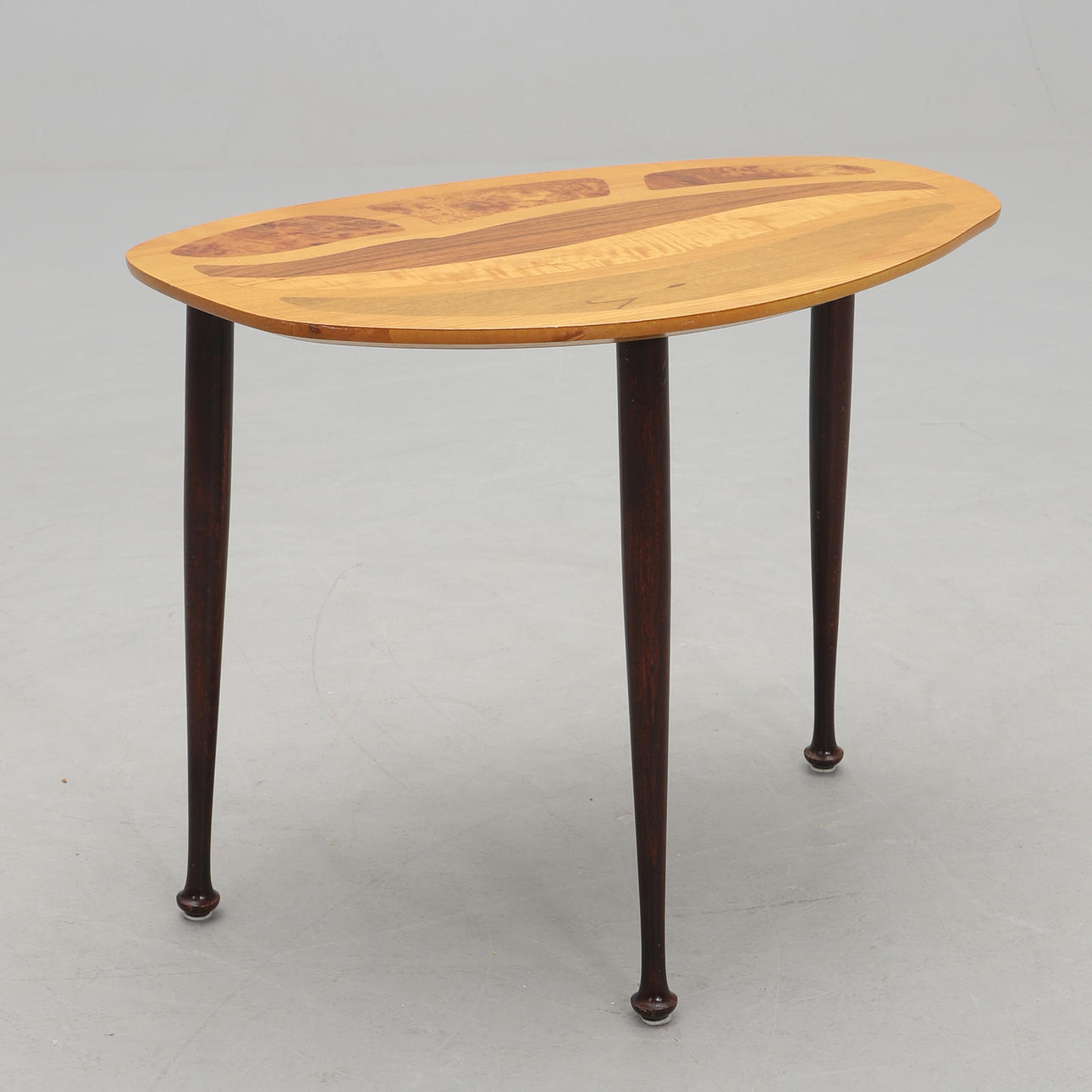 A Swedish modern side table. 1950s.