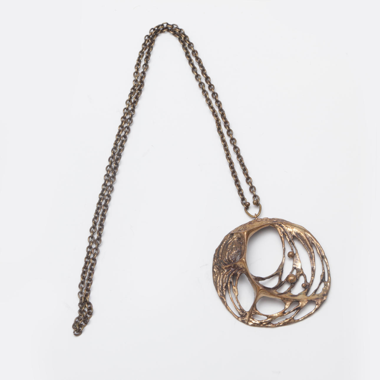A BRONZE NECKLACE, possibly Kalevala, unsigned.