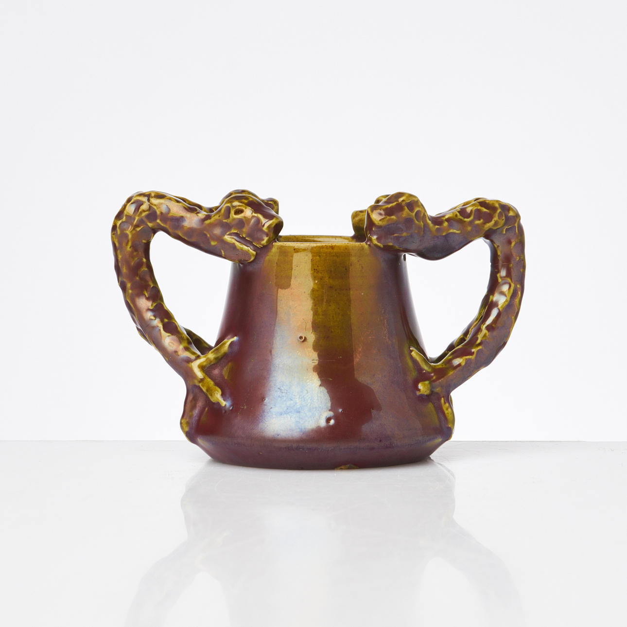 HELMER OSSLUND. A vase, glazed earthenware, decorated in the shape of a snake-like lizard, Höganäs, 18th/20th century.