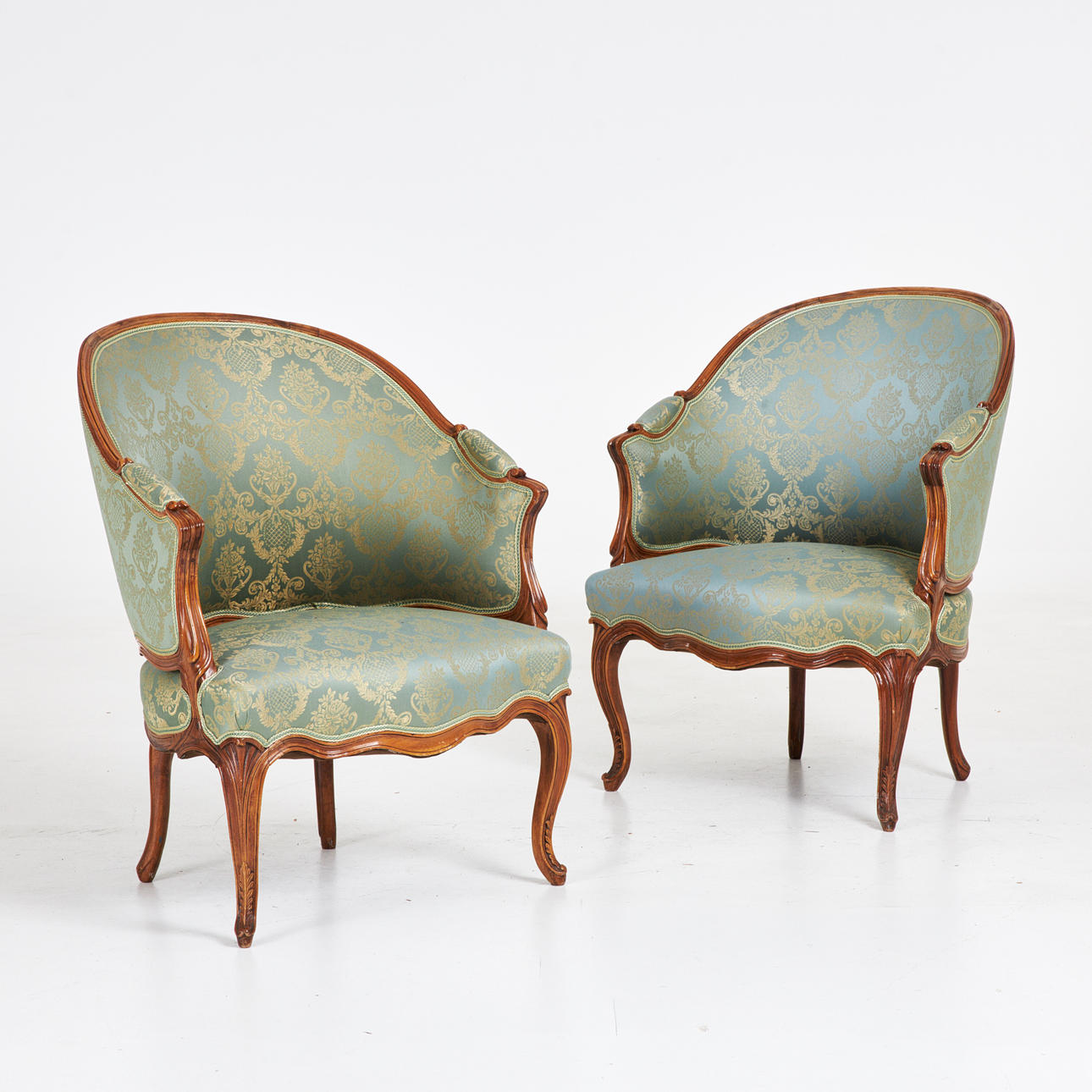 BERGER. 1 pair, Louis XV, cut decor, solid upholstered silk textile with green base gold colored decor.