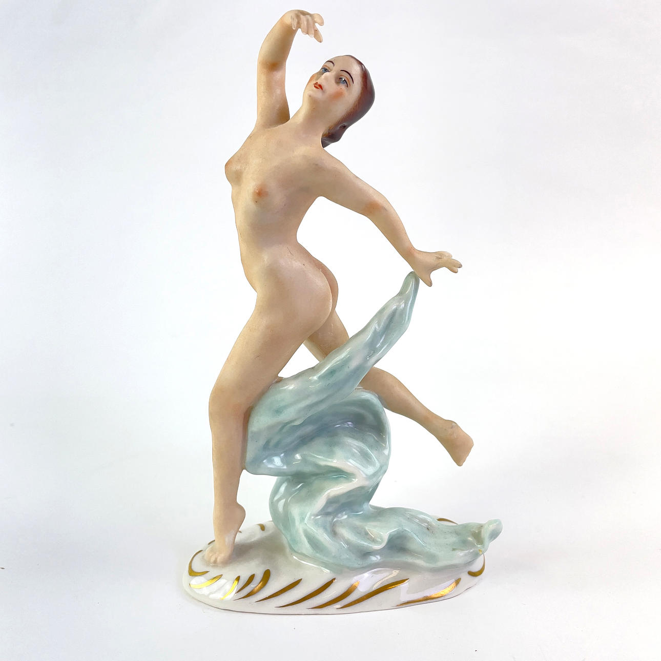 FIGURINES. A porcelain dancer from Dresden, Germany.