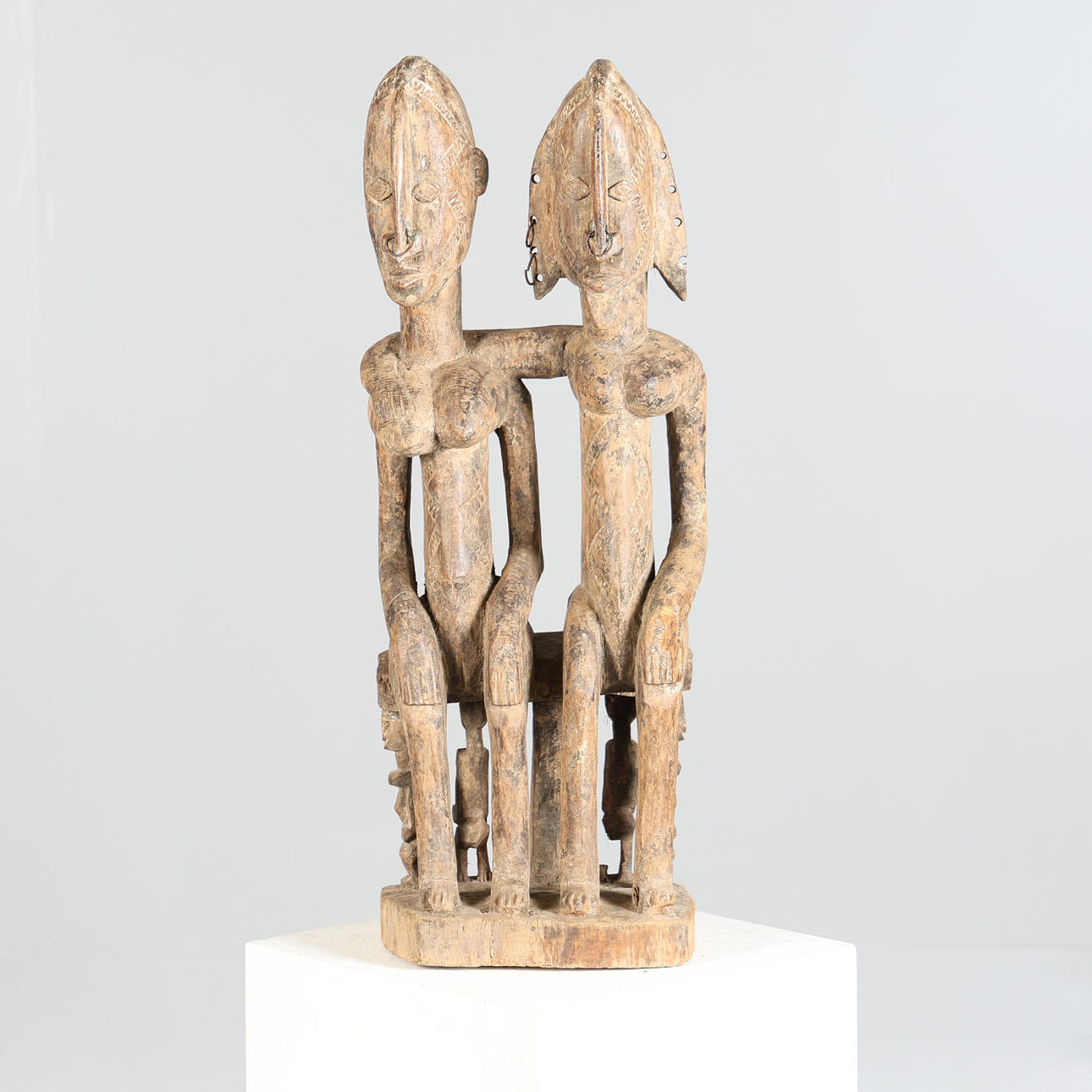 A DOGON SEATED COUPLE FIGURE, MALI.